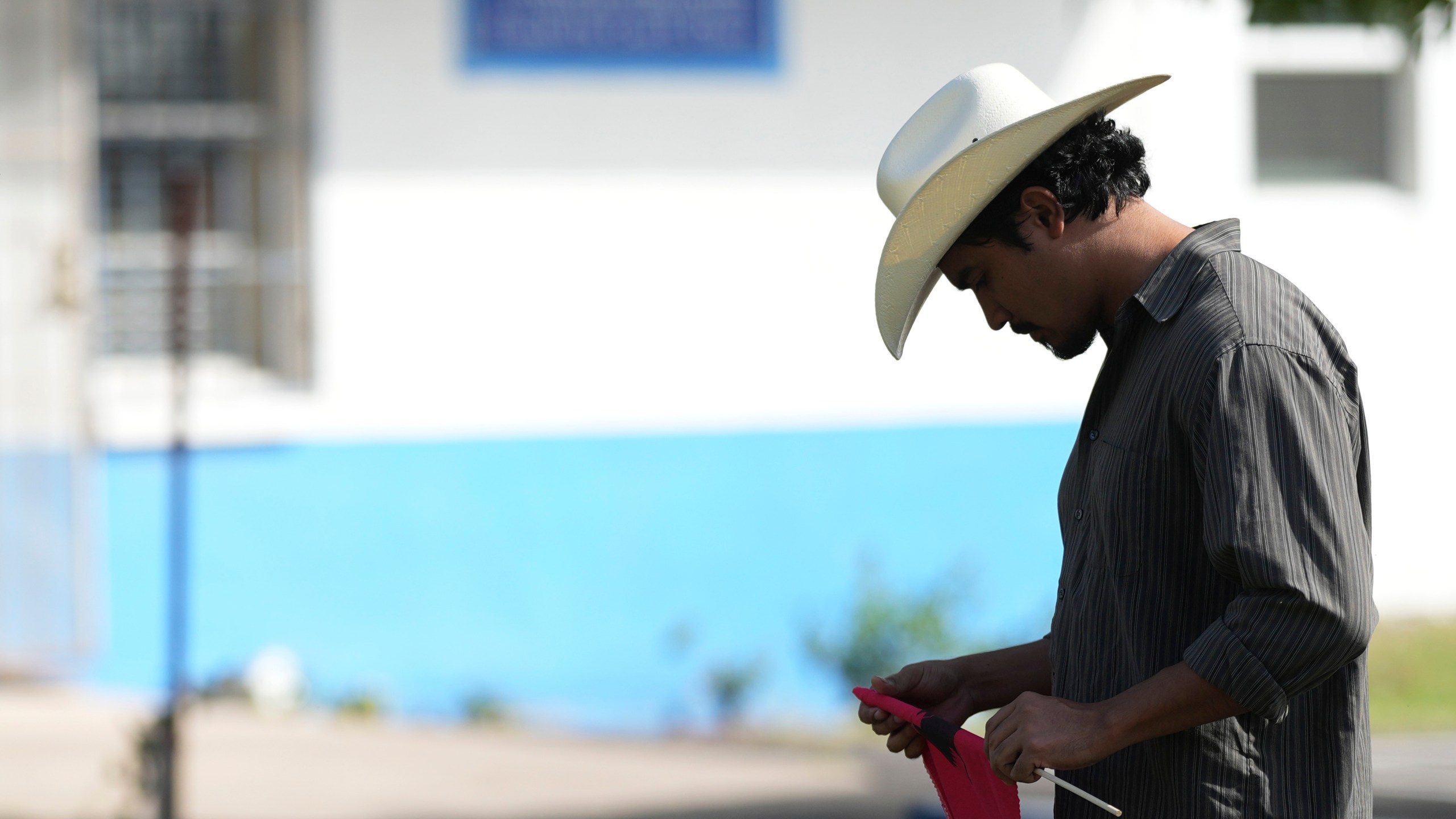 Michael Mireles, Votes Director of Civic Engagement for La Unión del Pueblo Entero (LUPE), listens as the group holds a news conference to talk about yesterday's election in San Juan, Texas, Wednesday, Nov. 6, 2024. (AP Photo/Eric Gay)