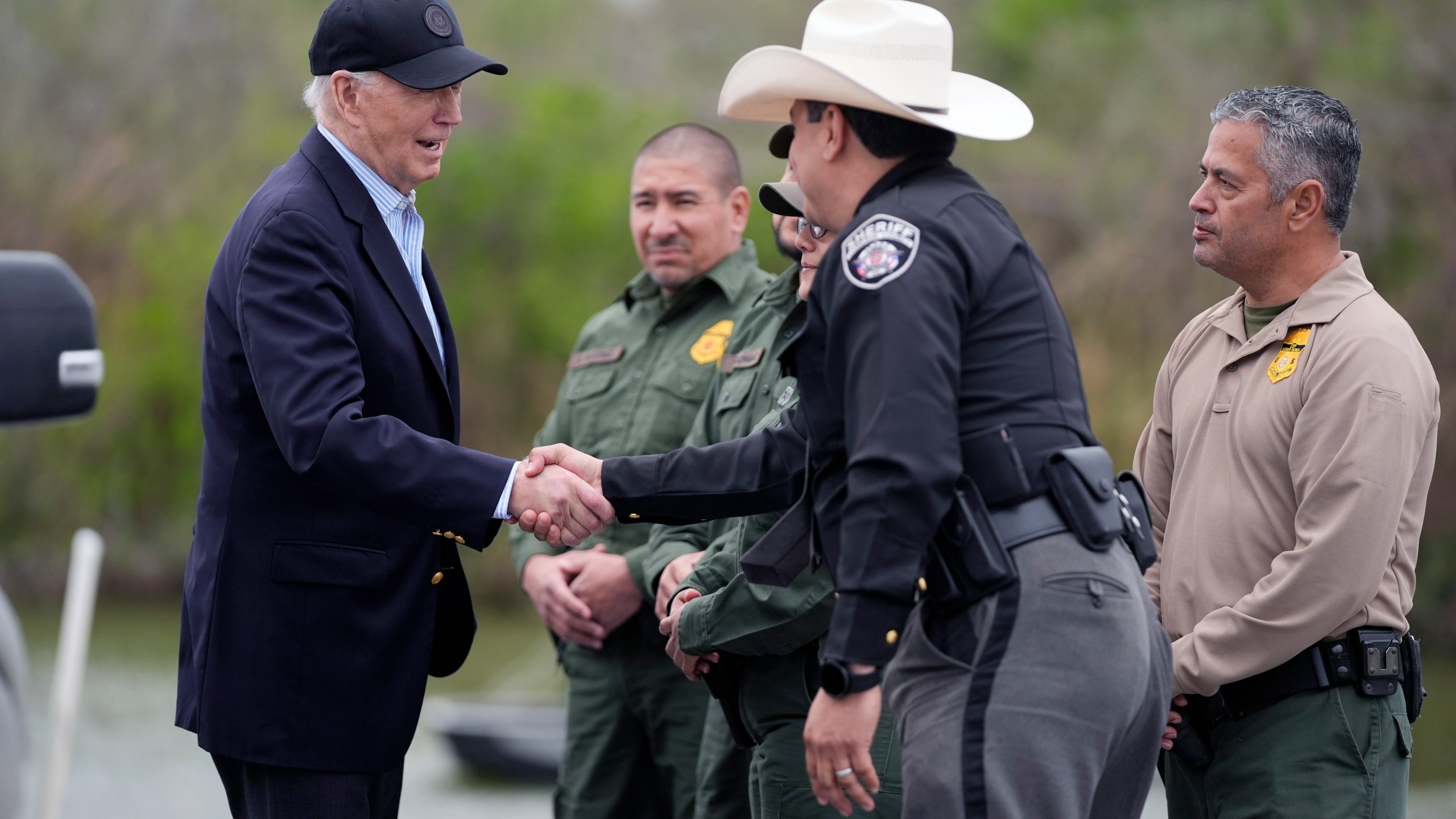 FILE - President Joe Biden talks with the U.S. Border Patrol and local officials, as he looks over the southern border, Feb. 29, 2024, in Brownsville, Texas, along the Rio Grande. (AP Photo/Evan Vucci, File)