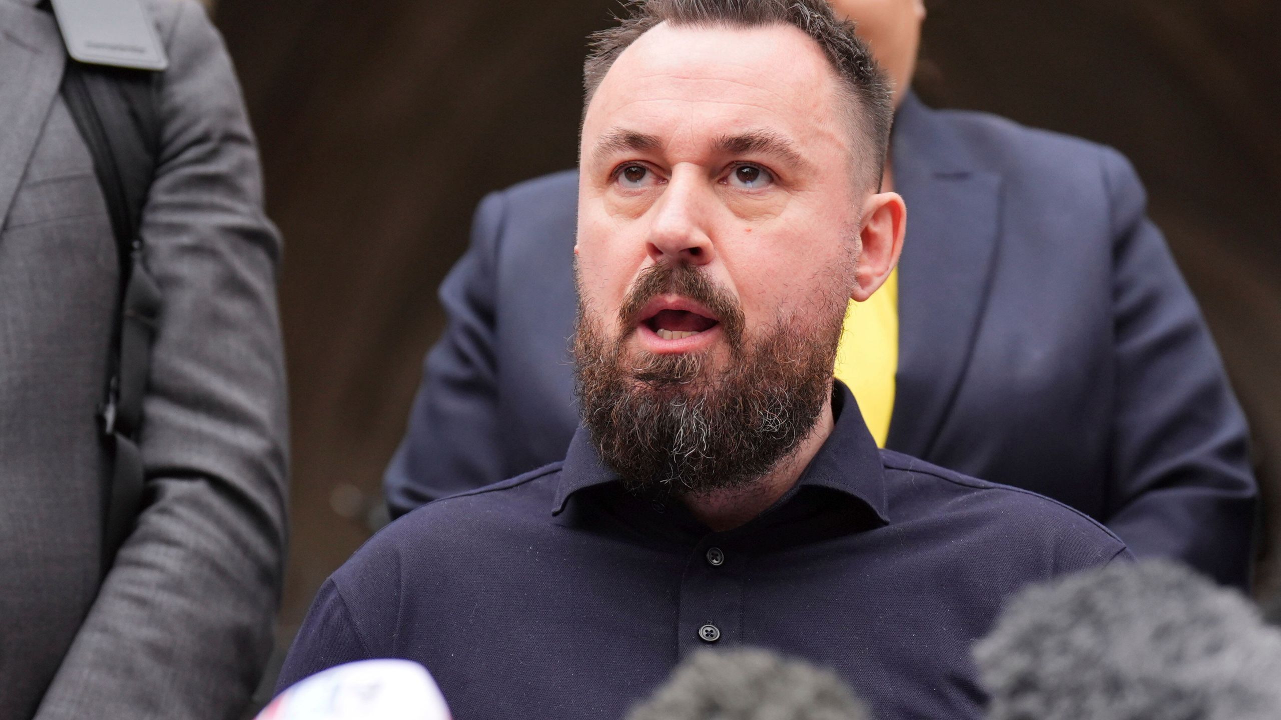 FILE - Martin Hibbert makes a statement outside the Royal Courts of Justice in London, July 25, 2024. (James Manning/PA via AP, File)