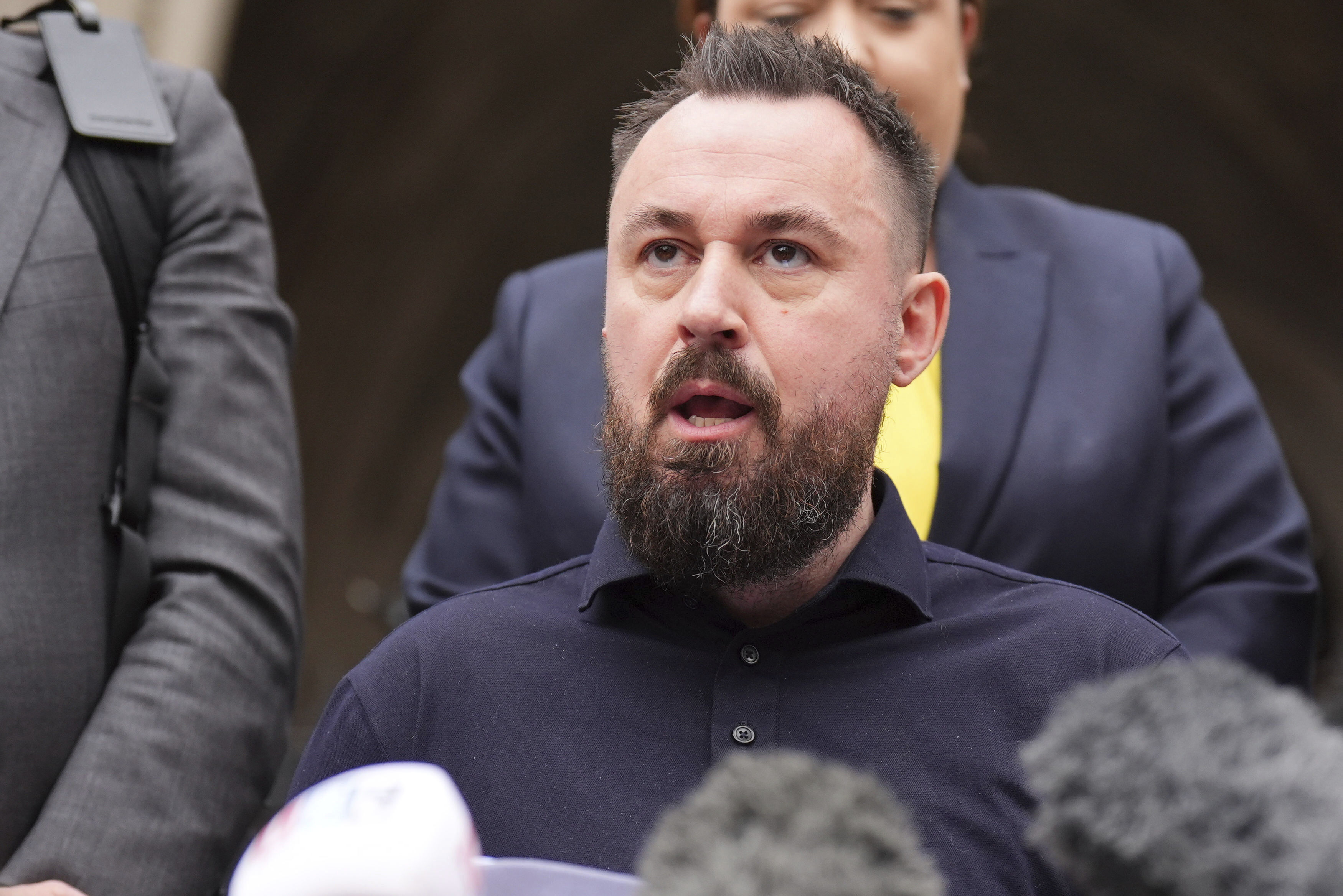 FILE - Martin Hibbert makes a statement outside the Royal Courts of Justice in London, July 25, 2024. (James Manning/PA via AP, File)