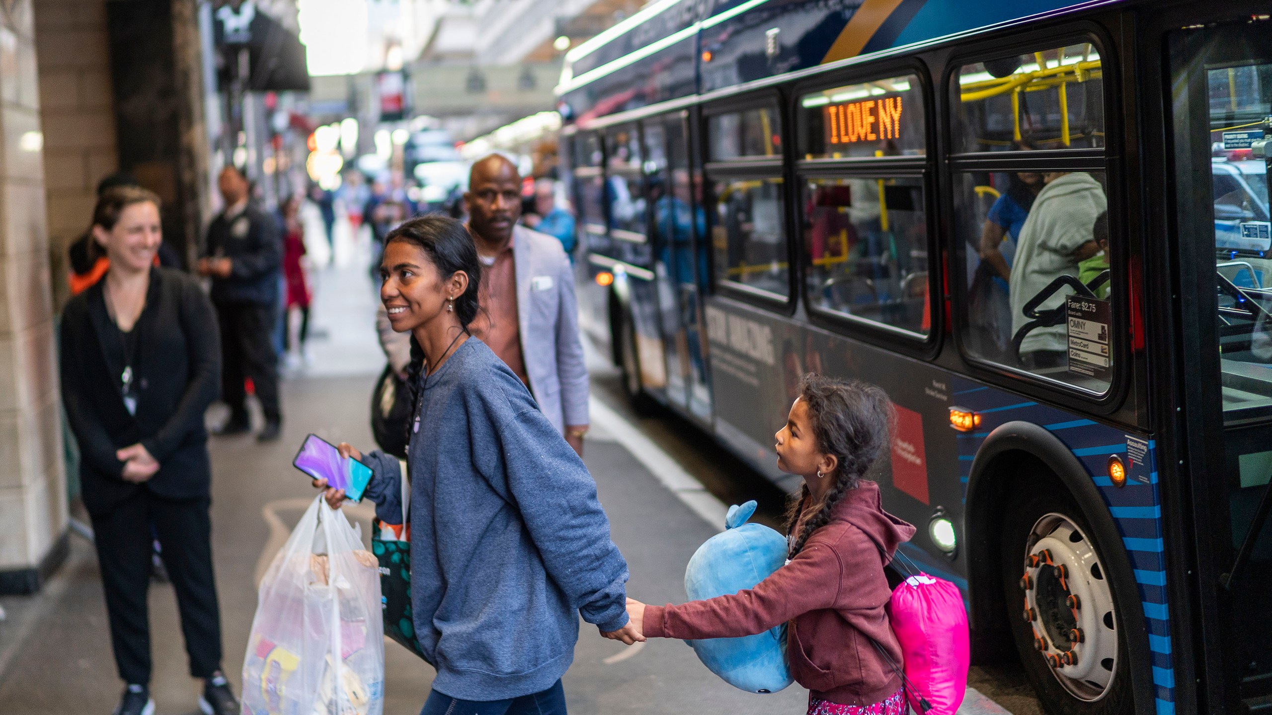 FILE - Asylum seekers arrive at the Roosevelt Hotel on Friday, May 19, 2023, in New York. (AP Photo/Eduardo Munoz Alvarez, File)