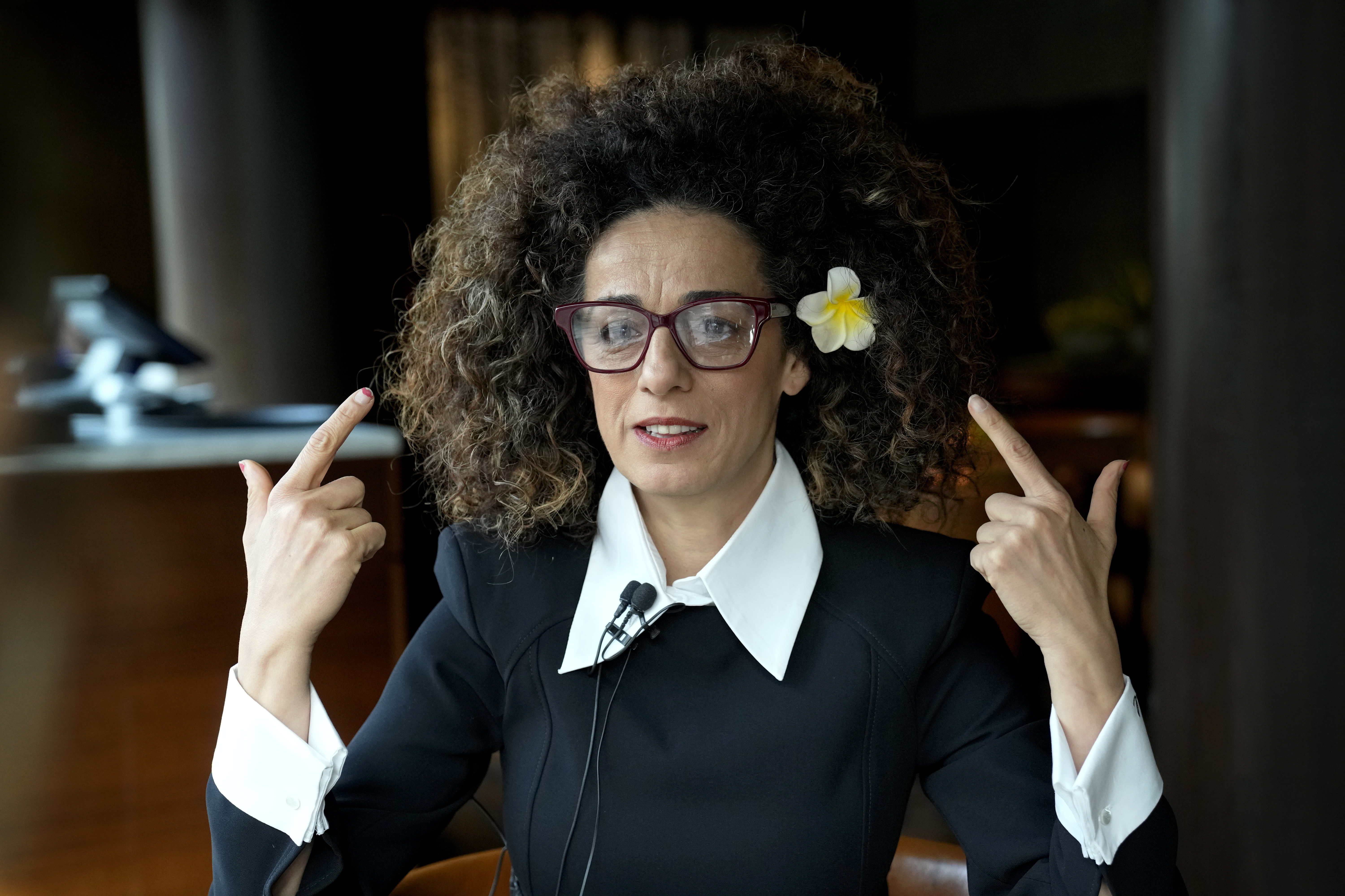 Masih Alinejad, 48, a prominent Iranian American human rights activist attends an interview with the Associated Press in Berlin, Germany, Saturday, Nov. 9, 2024. (AP Photo/Ebrahim Noroozi)