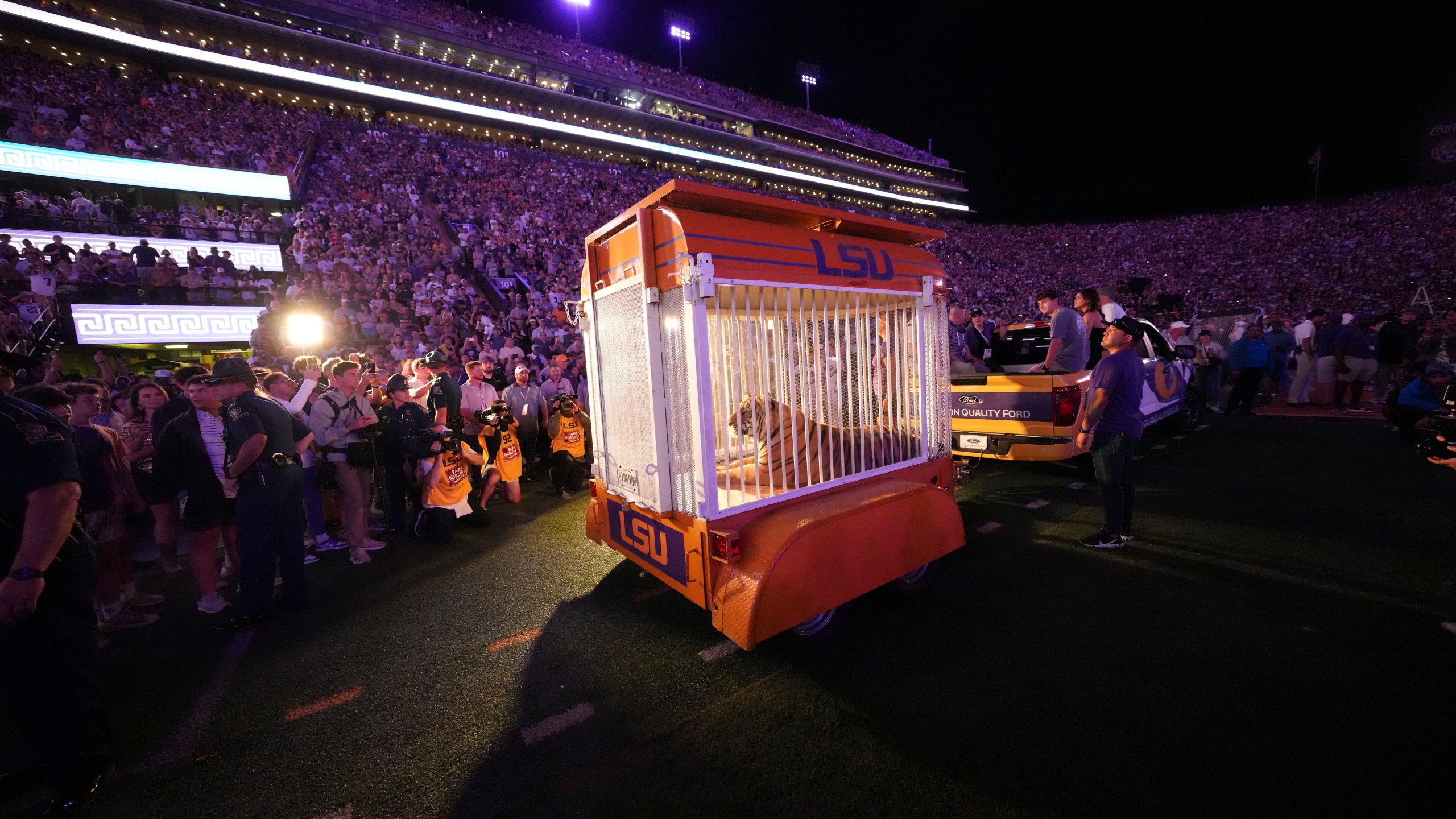 A live tiger is rolled into Tiger Stadium before an NCAA college football game between LSU and Alabama in Baton Rouge, La., Saturday, Nov. 9, 2024. (AP Photo/Gerald Herbert)