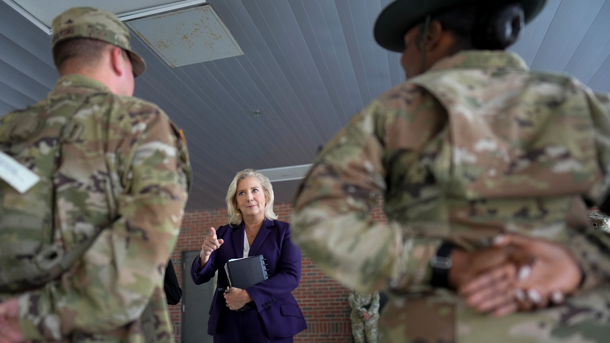 FILE - Army Secretary Christine Wormuth talks with soldiers at Fort Jackson, a U.S. Army Training Center, in Columbia, S.C., Sept. 25, 2024. (AP Photo/Chris Carlson, File)