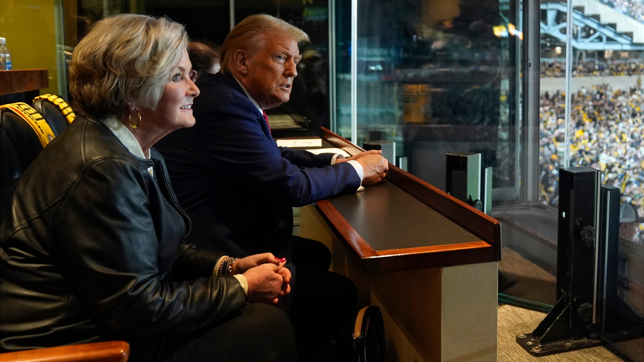 Republican presidential nominee former President Donald Trump sits with Susie Wiles as he attends the New York Jets football game against the Pittsburgh Steelers at Acrisure Stadium, Sunday, Oct. 20, 2024, in Pittsburgh. (AP Photo/Evan Vucci, Pool)