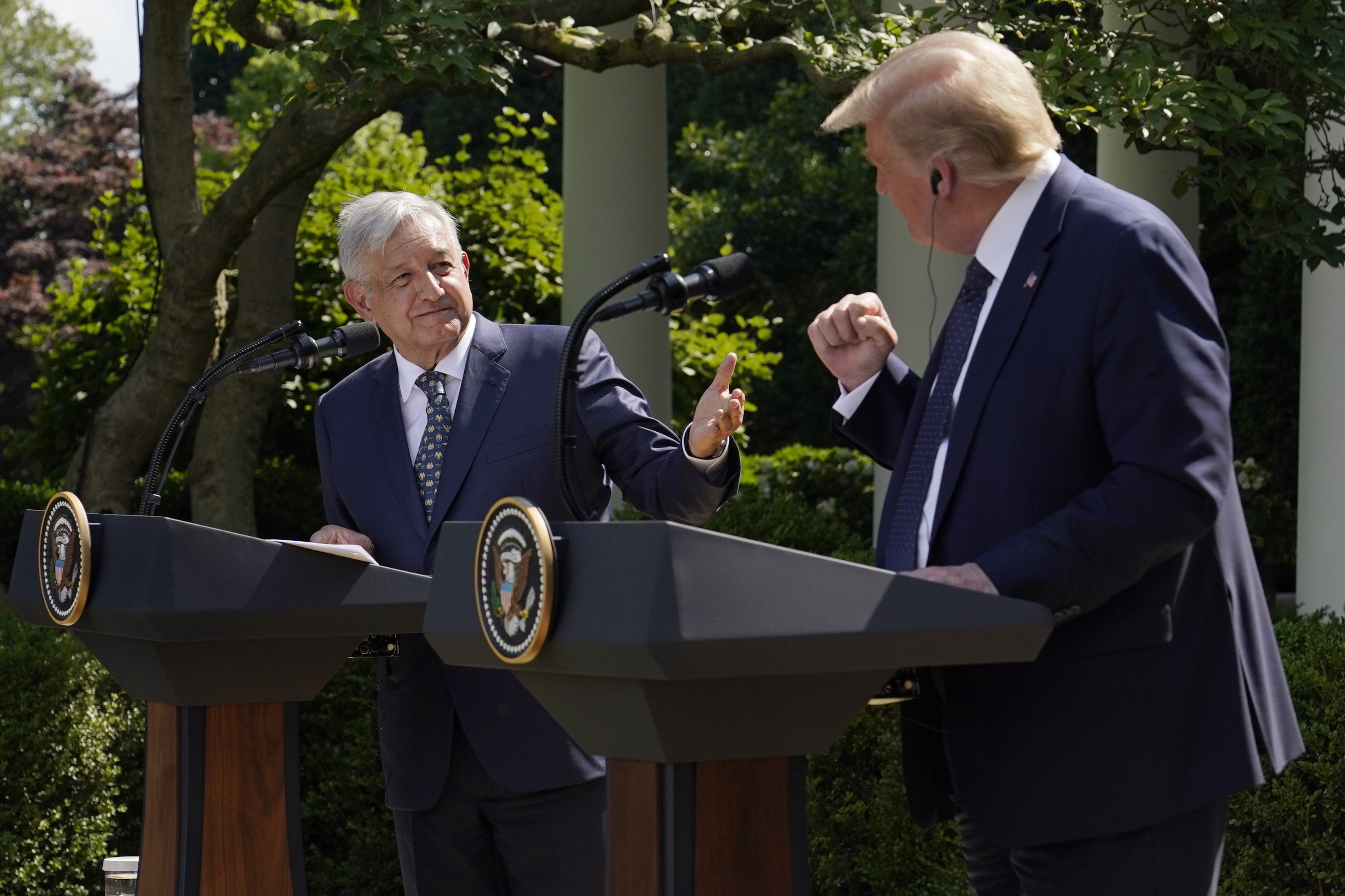 FILE - Mexico's President Andres Manuel Lopez Obrador, left, and President Donald Trump hold a joint news conference at the White House in Washington, July 8, 2020. (AP Photo/Evan Vucci, File)