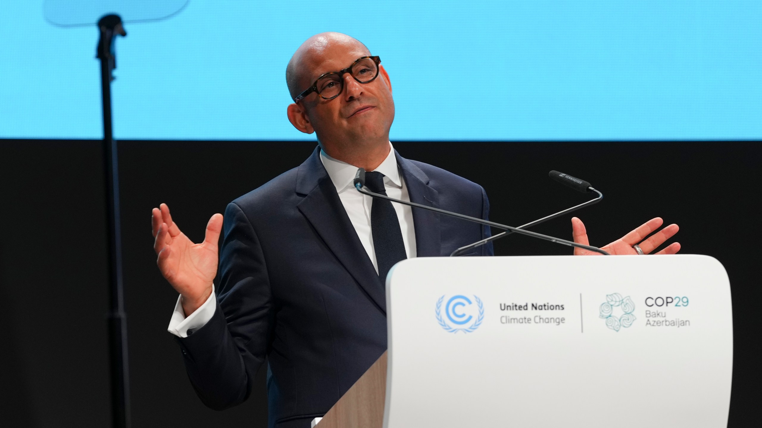 Simon Stiell, United Nations climate chief, speaks during the opening plenary session at the COP29 U.N. Climate Summit, Monday, Nov. 11, 2024, in Baku, Azerbaijan. (AP Photo/Peter Dejong)