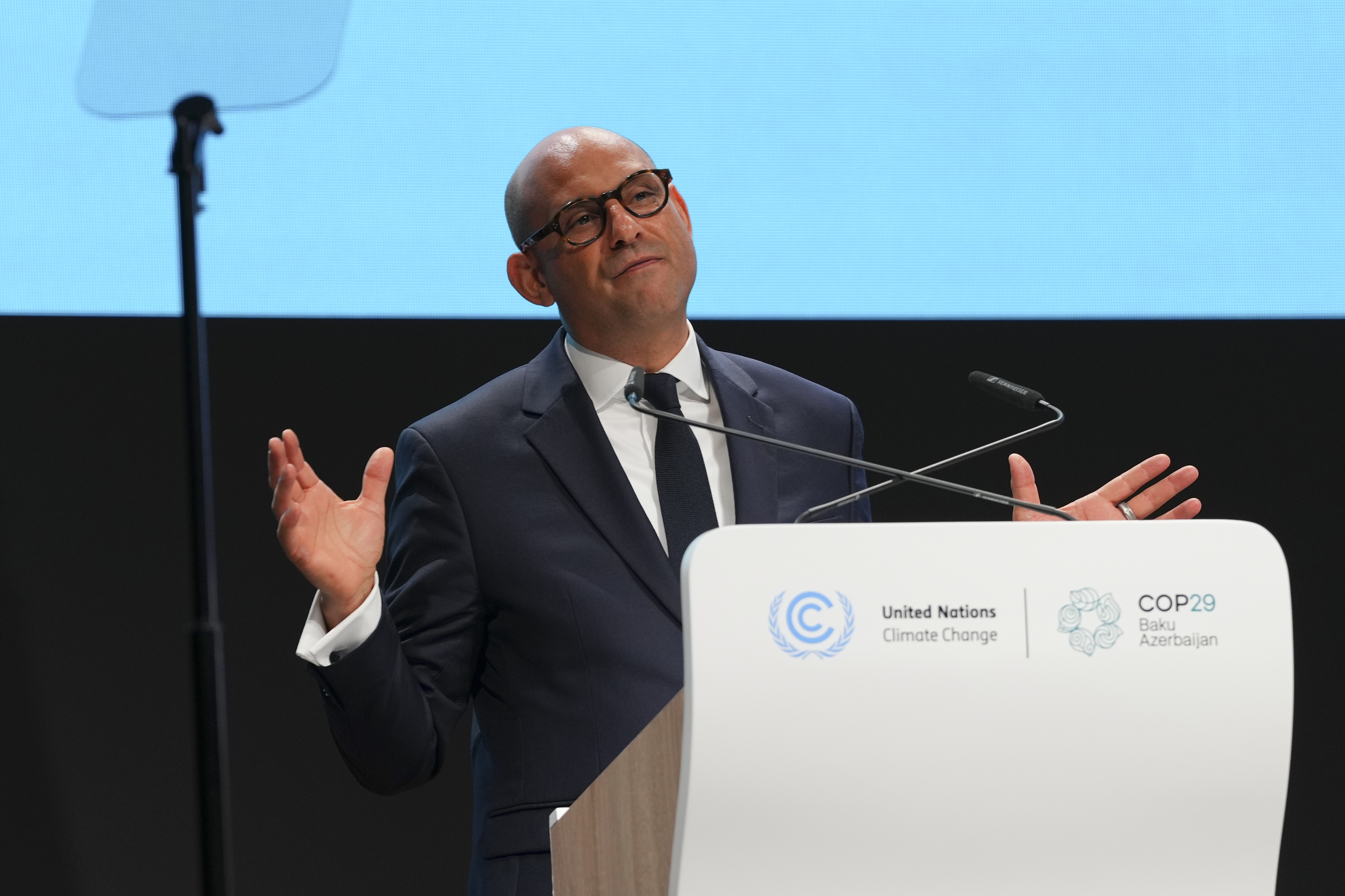 Simon Stiell, United Nations climate chief, speaks during the opening plenary session at the COP29 U.N. Climate Summit, Monday, Nov. 11, 2024, in Baku, Azerbaijan. (AP Photo/Peter Dejong)