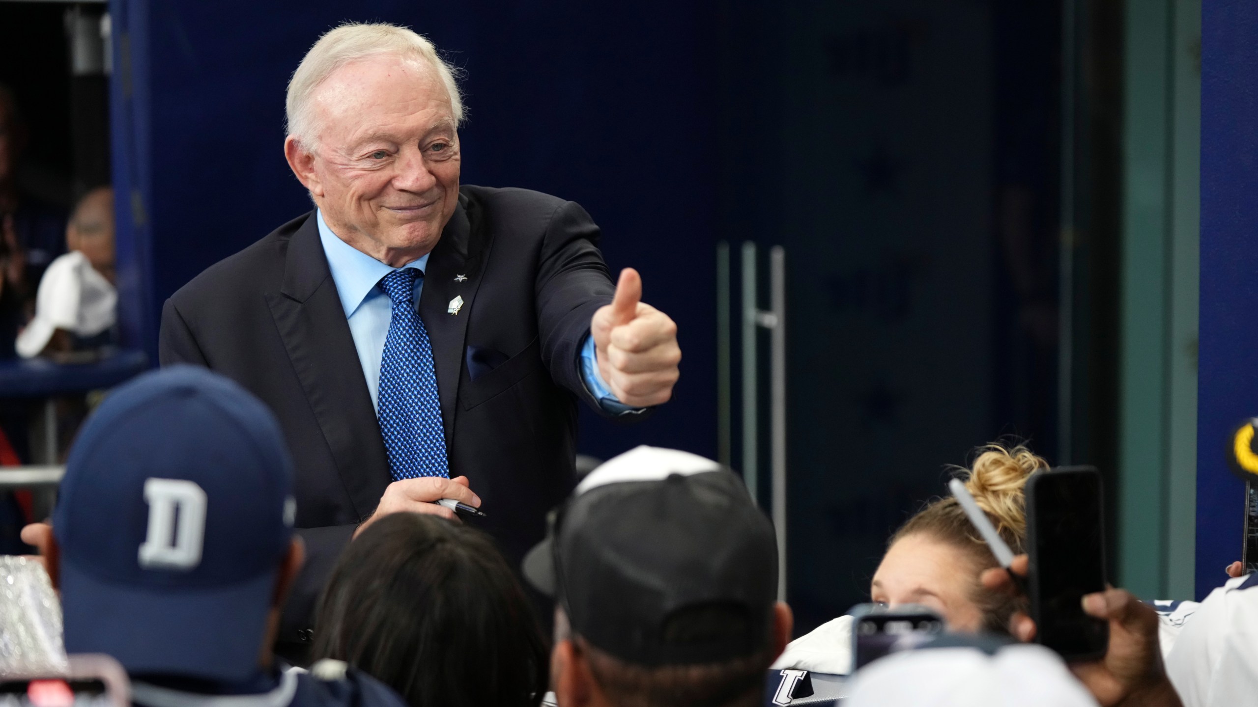 Dallas Cowboys team owner Jerry Jones interacts with fans before an NFL football game against the Philadelphia Eagles in Arlington, Texas, Sunday, Nov. 10, 2024. (AP Photo/Jeffrey McWhorter)