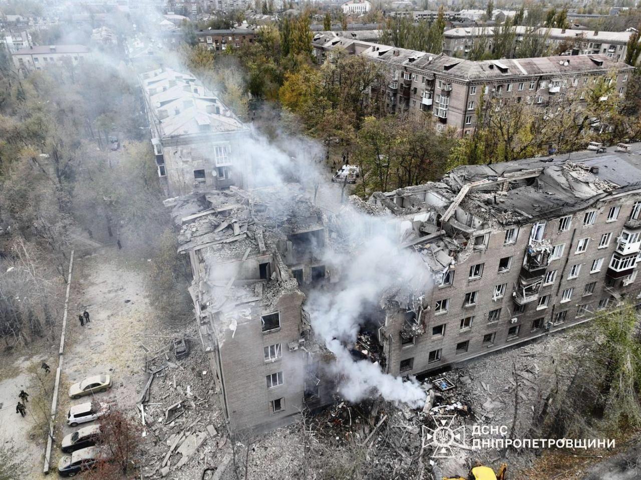 In this image provided by the Ukrainian Emergency Service on Monday, Nov. 11, 2024, a smoke rises out of an apartments building after a Russian attack in Kryvyi Rih, Ukraine. (Ukrainian Emergency Service via AP)