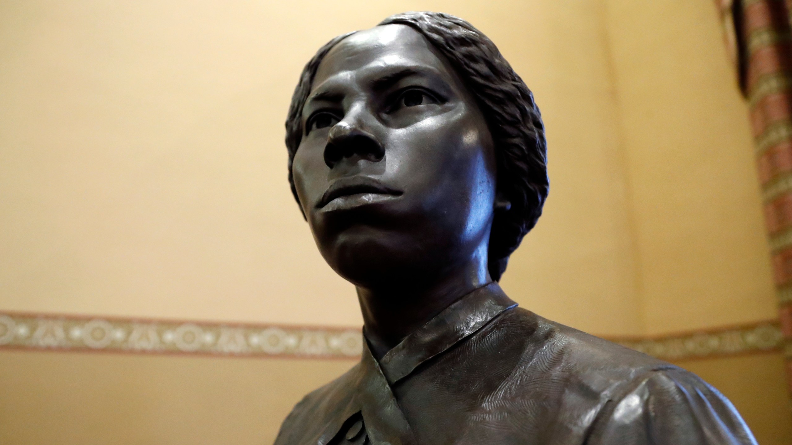 FILE - A bronze statue of abolitionist Harriet Tubman is seen at the Maryland State House, Feb. 10, 2020, in Annapolis, Md. (AP Photo/Julio Cortez, file)