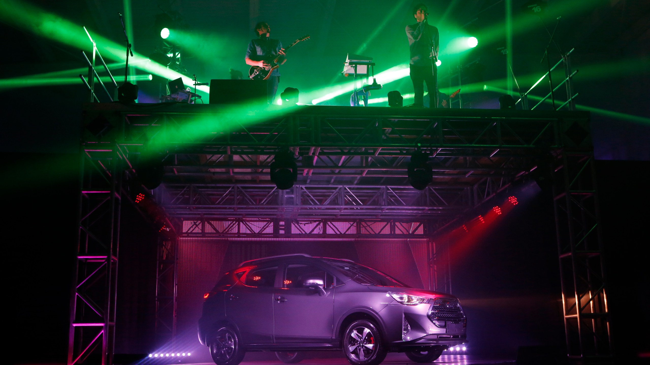 FILE - An SUV model built in Mexico for Chinese state-owned automaker JAC Motors is presented in the country's first JAC showroom, in Naucalpan, on the outskirts of Mexico City, March 28, 2017. (AP Photo/Rebecca Blackwell, File)