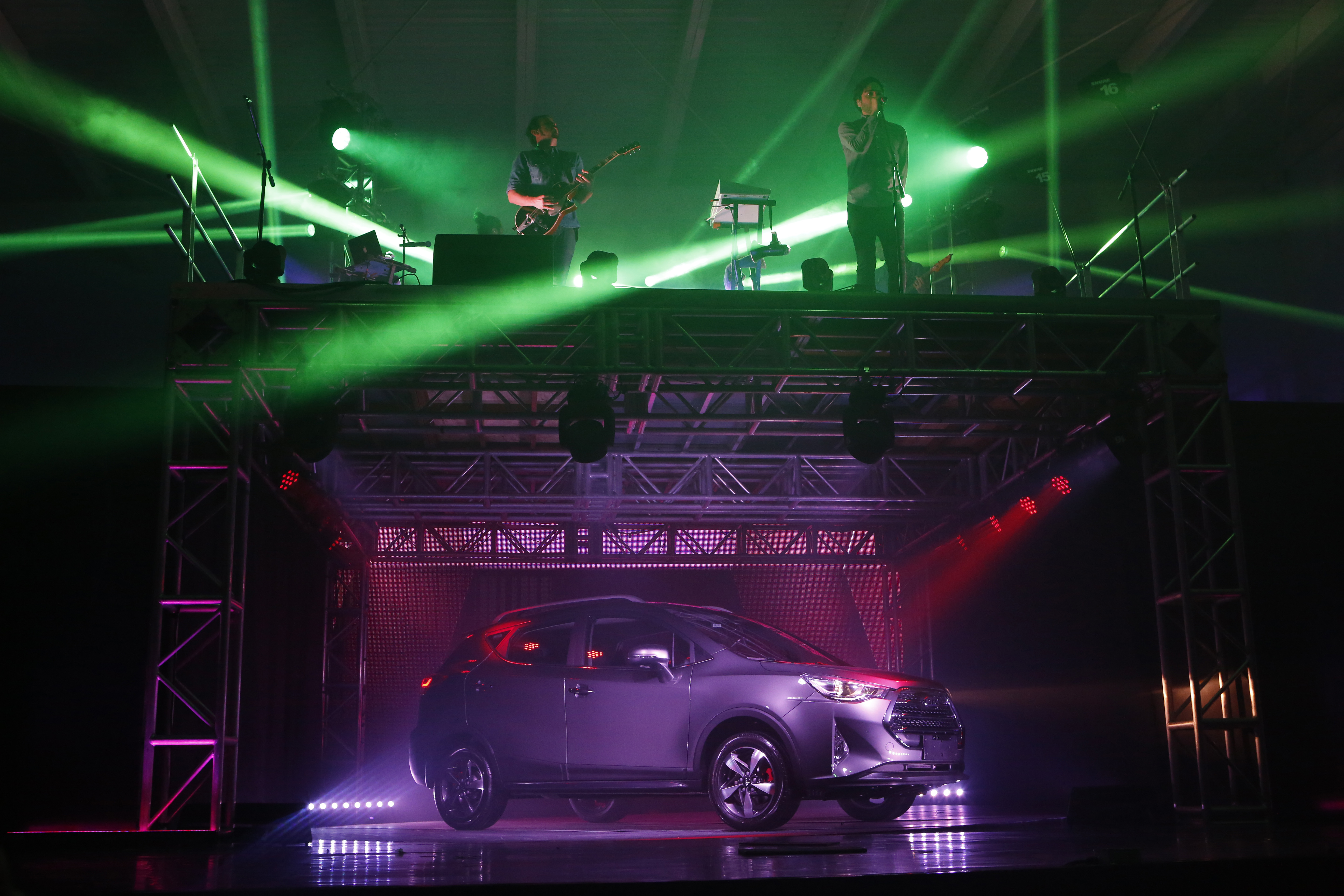 FILE - An SUV model built in Mexico for Chinese state-owned automaker JAC Motors is presented in the country's first JAC showroom, in Naucalpan, on the outskirts of Mexico City, March 28, 2017. (AP Photo/Rebecca Blackwell, File)