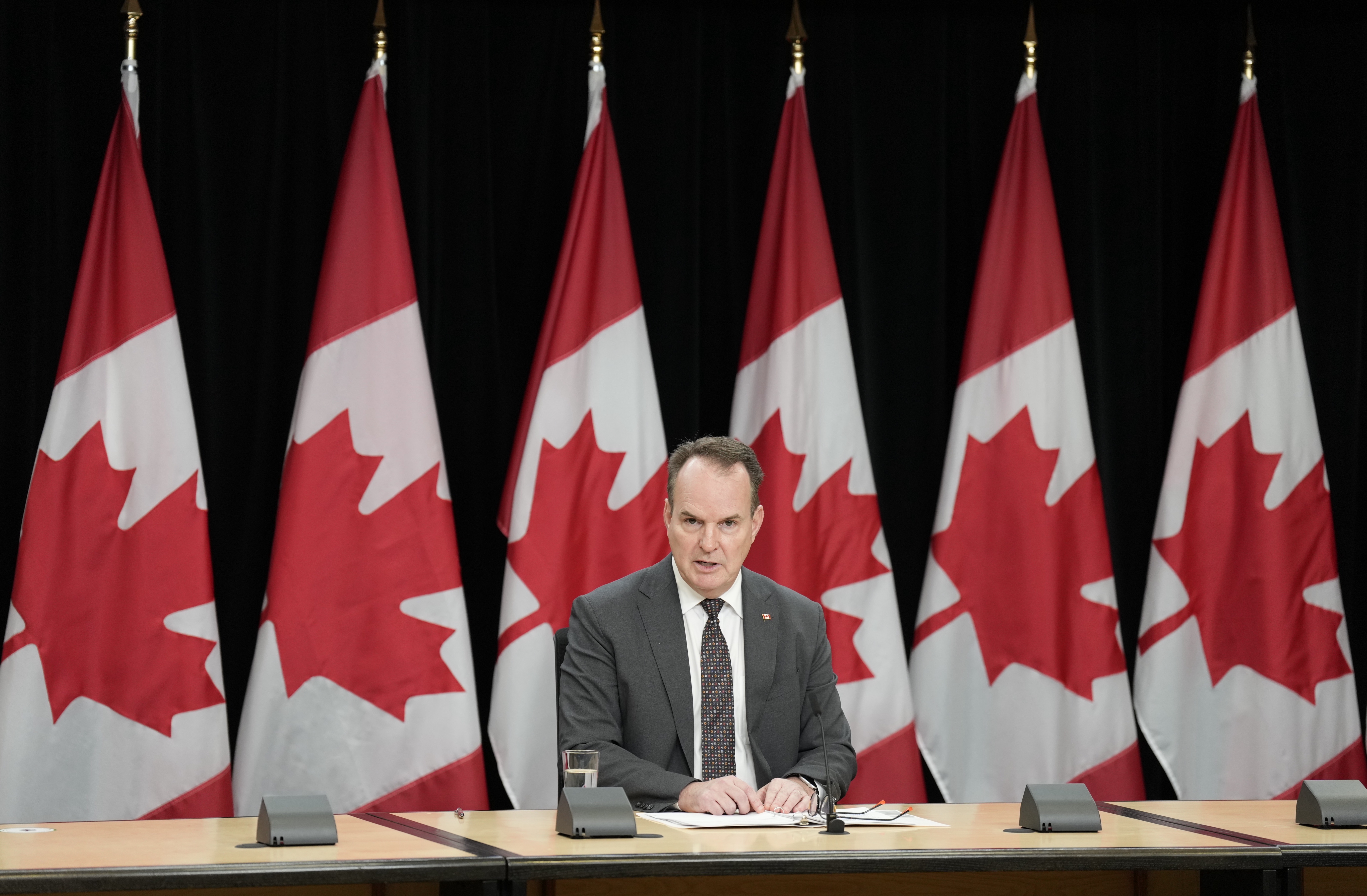 Canada Labour Minister Steven MacKinnon speaks with media during a news conference, Tuesday, Nov. 12, 2024, in Ottawa. (Adrian Wyld/The Canadian Press via AP)