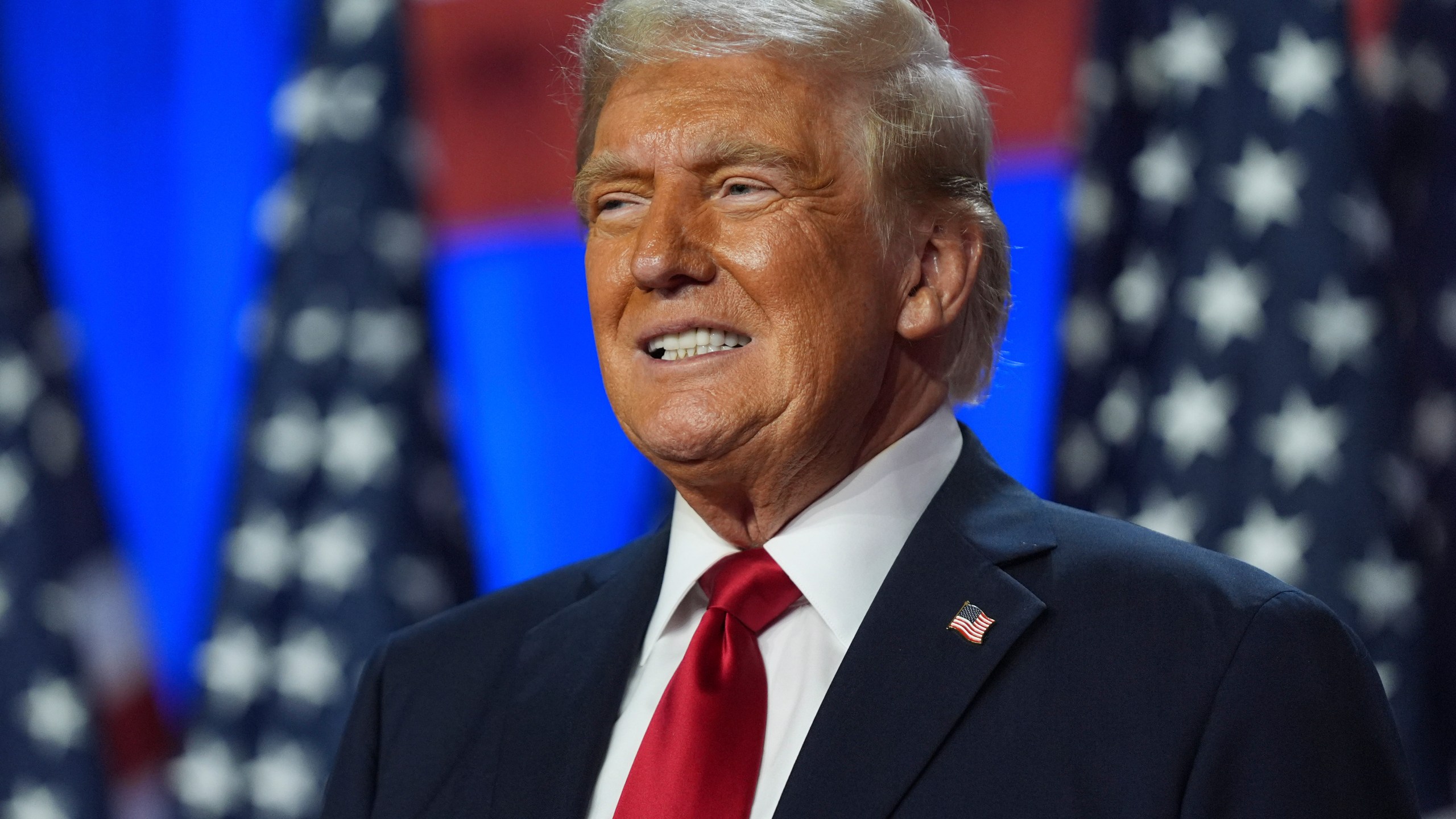 FILE - Republican presidential nominee former President Donald Trump smiles at an election night watch party at the Palm Beach Convention Center, Wednesday, Nov. 6, 2024, in West Palm Beach, Fla. (AP Photo/Evan Vucci, File)