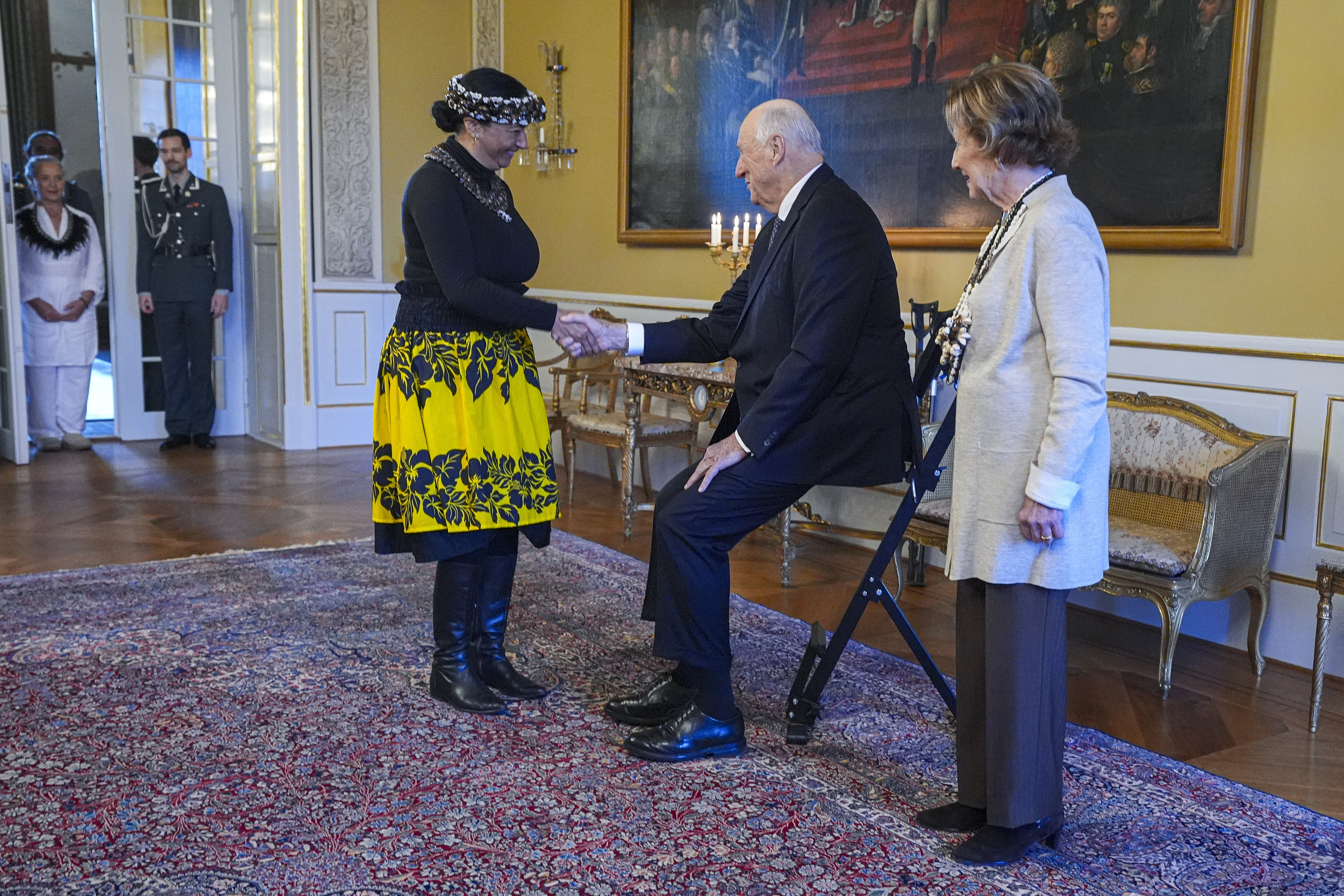 Norway's King Harald, centre, and Queen Sonja, right, welcome Rapa Nui Chilean politician Laura Tarita Rapu Alarcon, at the Royal Palace, in Oslo, Norway, Tuesday, Nov. 12, 2024. (Lise Åserud/NTB Scanpix via AP)