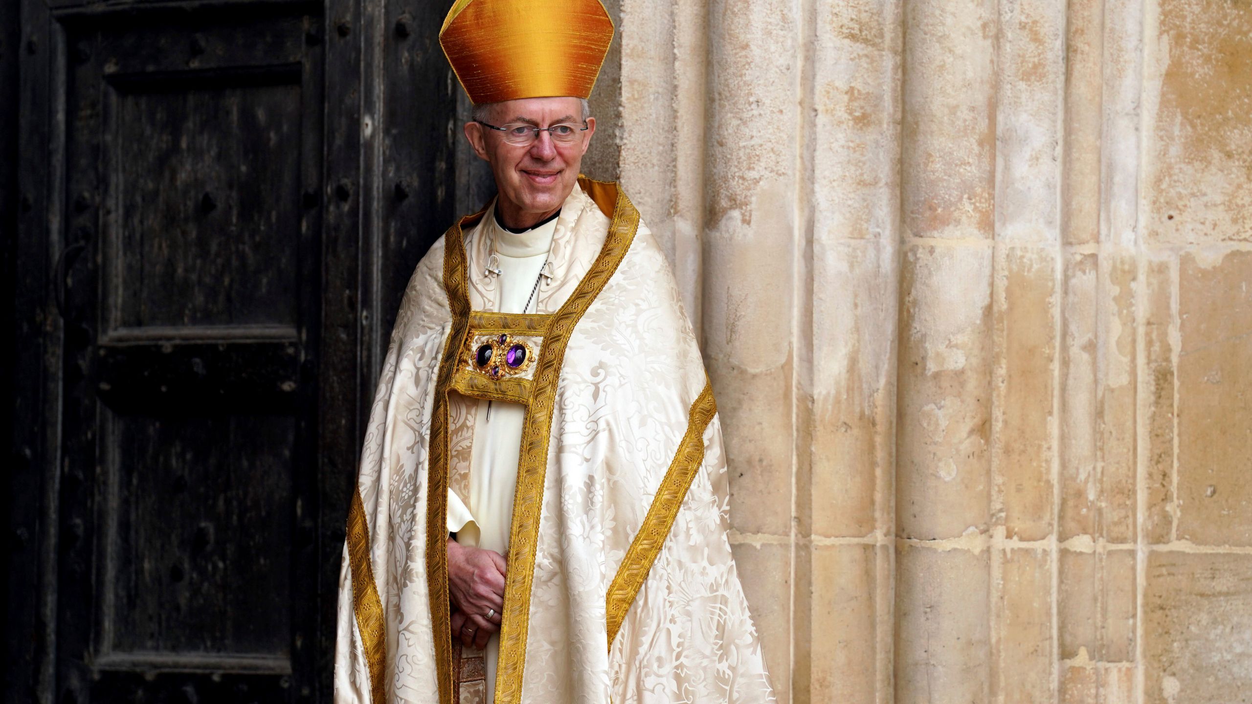 FILE - Archbishop of Canterbury Justin Welby stands at Westminster Abbey ahead of the coronation of King Charles III and Camilla, the Queen Consort, in London, Saturday, May 6, 2023. (Andrew Milligan/Pool via AP, File)