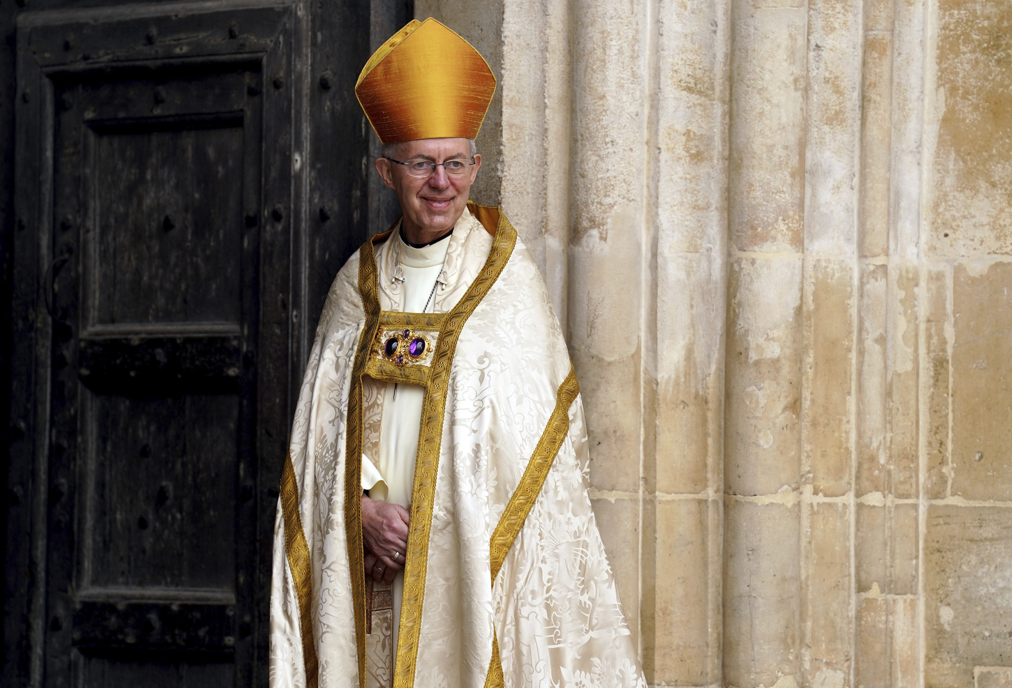 FILE - Archbishop of Canterbury Justin Welby stands at Westminster Abbey ahead of the coronation of King Charles III and Camilla, the Queen Consort, in London, Saturday, May 6, 2023. (Andrew Milligan/Pool via AP, File)