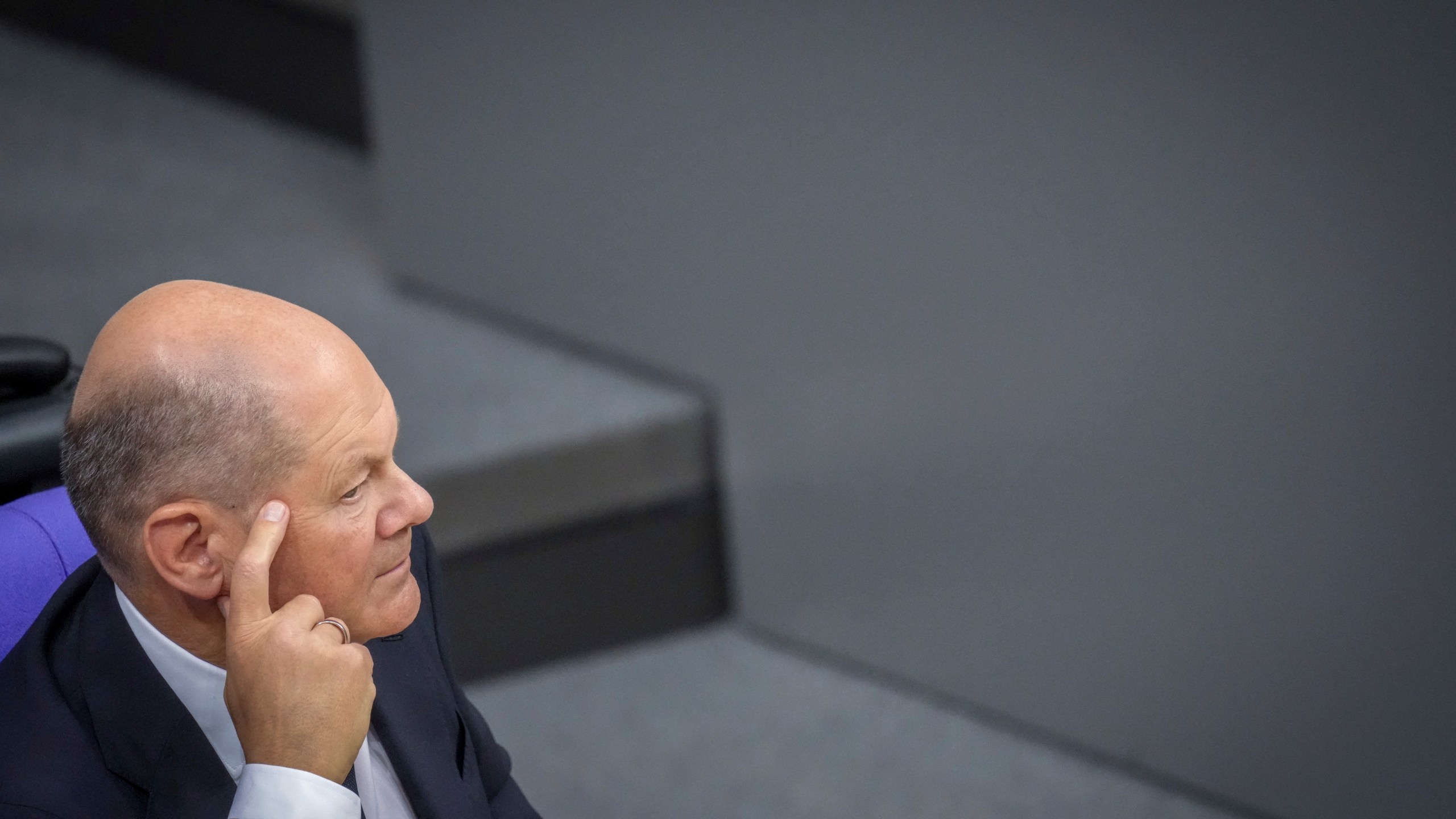 German Chancellor Olaf Scholz takes part in the German parliament Bundestag session following his government statement in Berlin, Wednesday, Nov. 13, 2024. (Kay Nietfeld/dpa via AP)