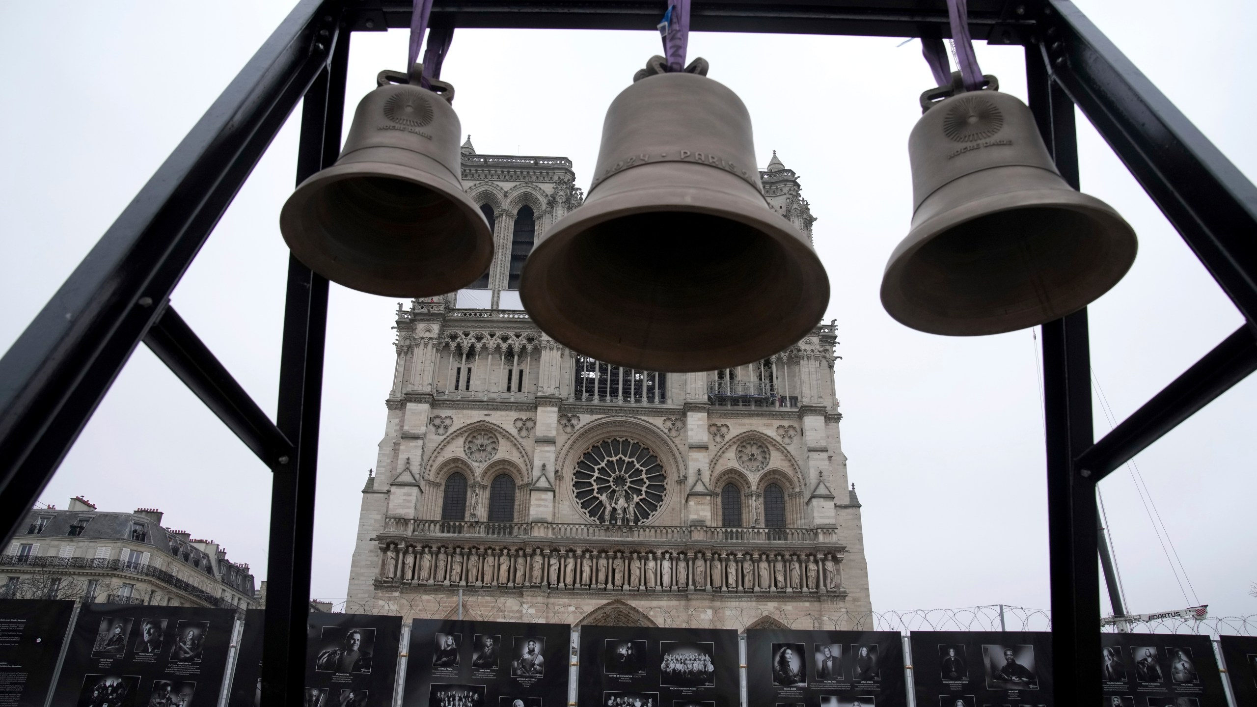 A bell, center, that Olympic medalists rang at the Paris Games, is seen before being installed in Notre Dame Cathedral, ahead of the monument's grandiose reopening following a massive fire and five-year reconstruction effort, Thursday, Nov. 7, 2024 in Paris. (AP Photo/Christophe Ena)