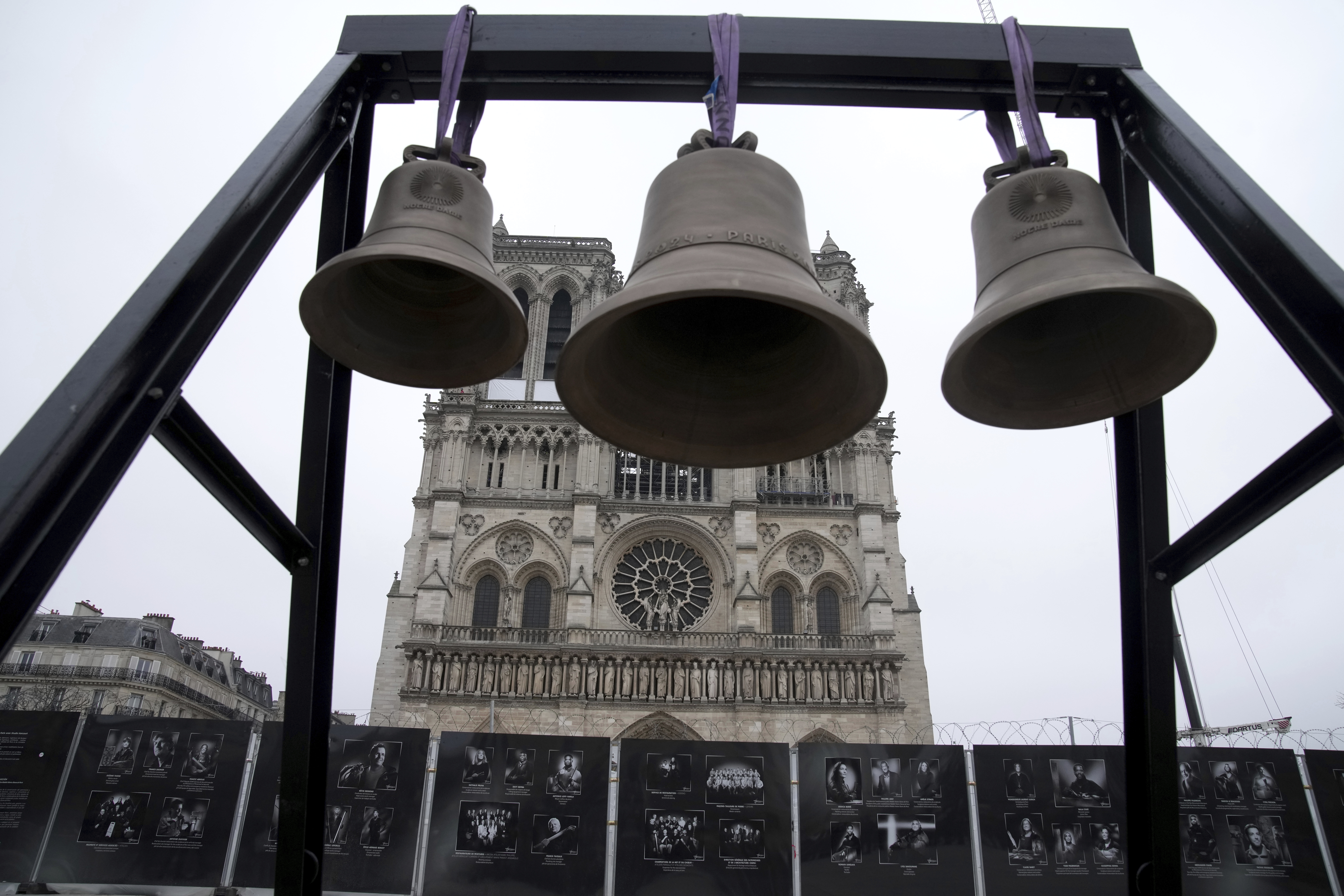 A bell, center, that Olympic medalists rang at the Paris Games, is seen before being installed in Notre Dame Cathedral, ahead of the monument's grandiose reopening following a massive fire and five-year reconstruction effort, Thursday, Nov. 7, 2024 in Paris. (AP Photo/Christophe Ena)