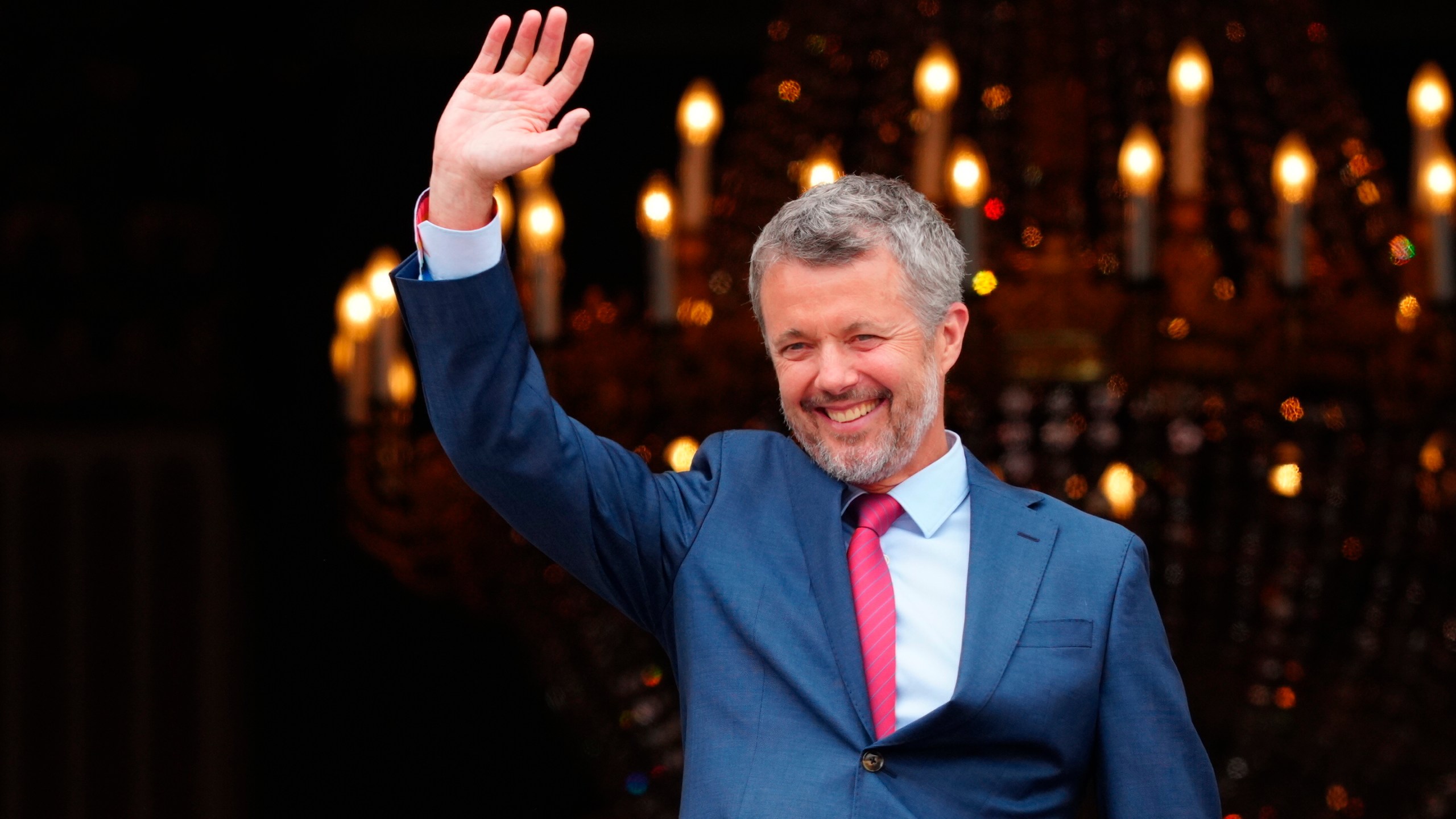 FILE - Denmark's King Frederik X, celebrating his 56th birthday, waves from the balcony of Frederik VIII's Palace, Amalienborg Castle in Copenhagen, Sunday, May 26, 2024. (Ida Marie Odgaard/Ritzau Scanpix via AP, File)