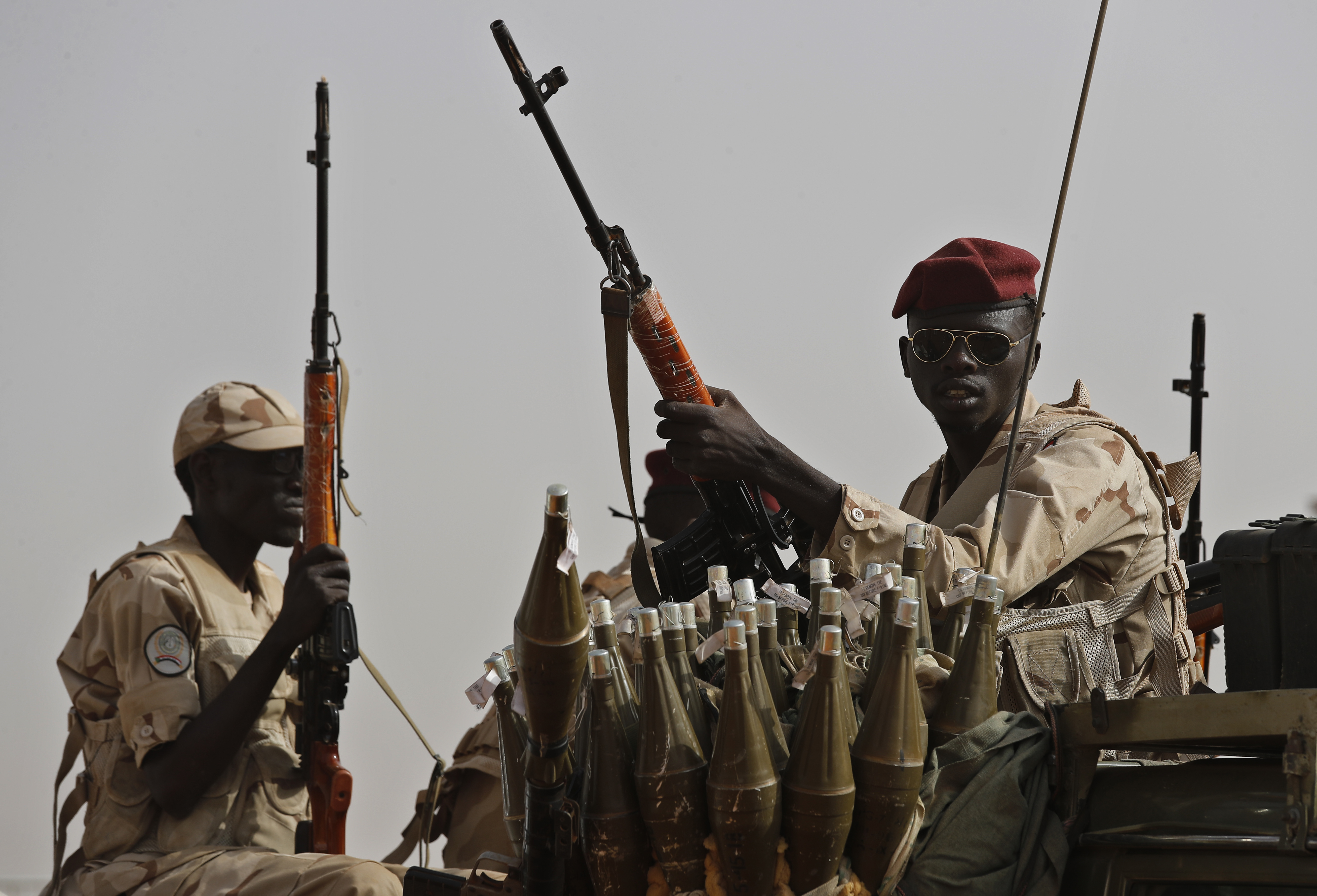 FILE - Sudanese soldiers from the Rapid Support Forces unit secure the area in the East Nile province, Sudan, on June 22, 2019. (AP Photo/Hussein Malla, File)