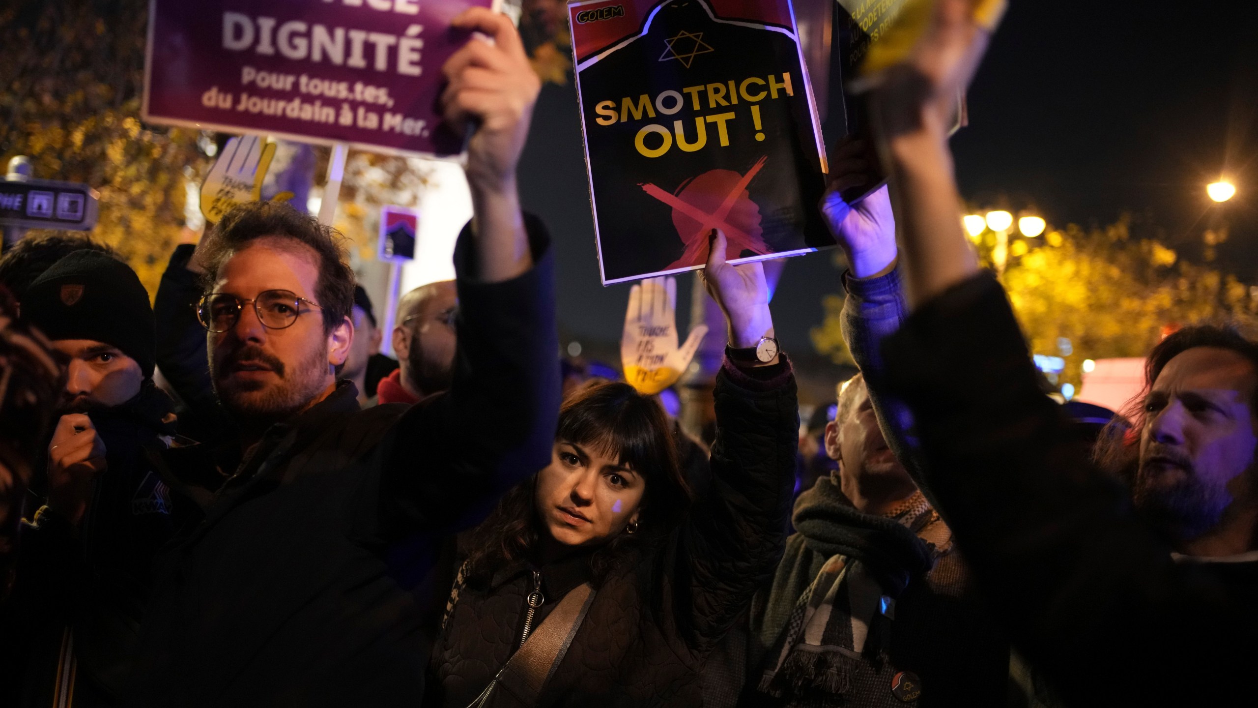 Protesters take part in a rally against the "Israel is Forever" gala organized by far-right Franco-Israeli figures, in Paris, Wednesday, Nov. 13, 2024, on the eve of the UEFA Nations League 2025 soccer match between France and Israel. (AP Photo/Christophe Ena)