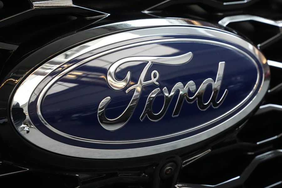 FILE - The Ford logo is seen on the grill of a Ford Explorer on display at the Pittsburgh International Auto Show in Pittsburgh, on Feb. 15, 2024. (AP Photo/Gene J. Puskar, File)