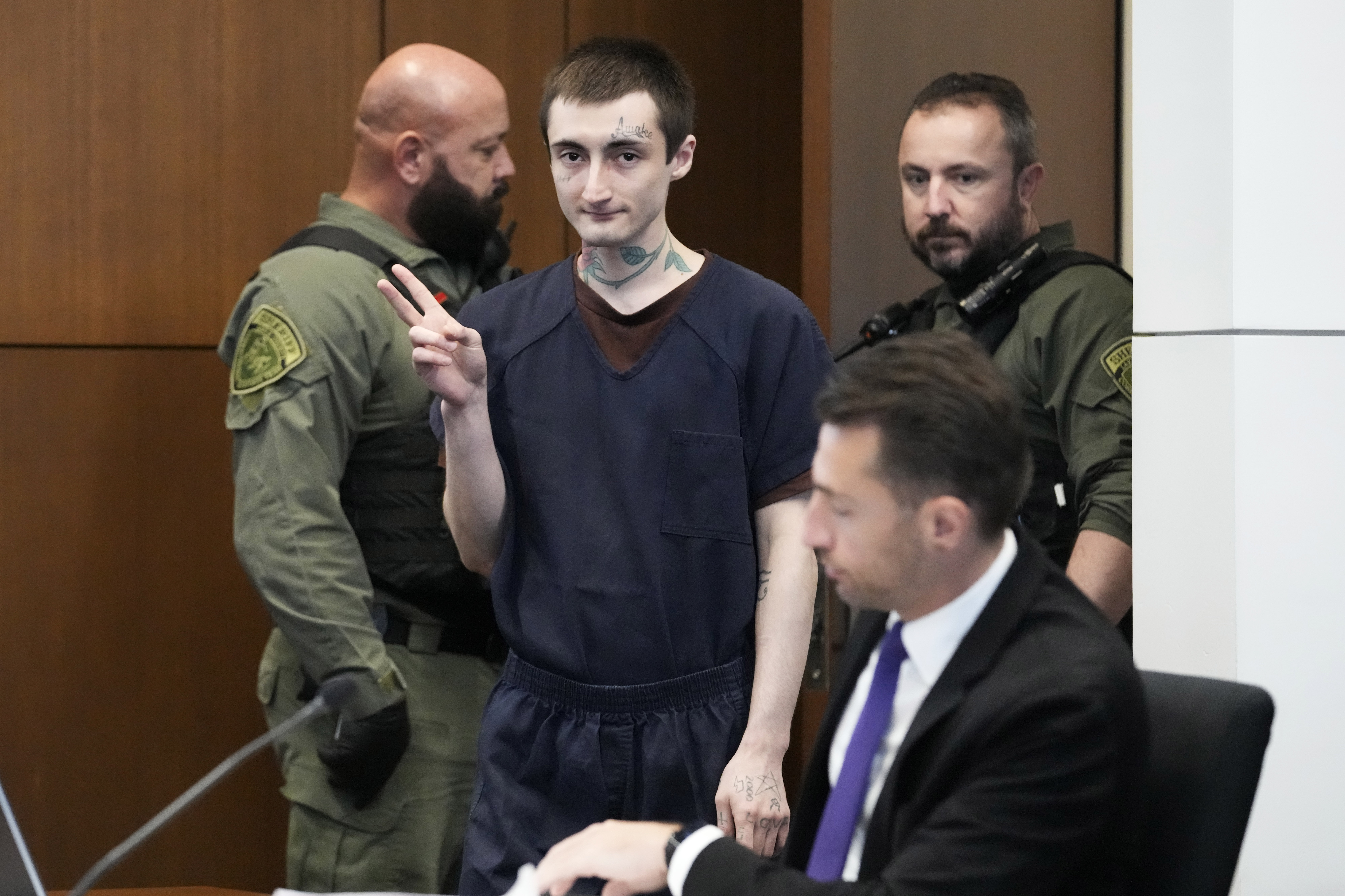 Robert E. Crimo III gestures as he attends the hearing on motions before Judge Victoria A. Rossetti at the Lake County Courthouse in Waukegan, Ill., Thursday, Nov. 14, 2024. (AP Photo/Nam Y. Huh, Pool)