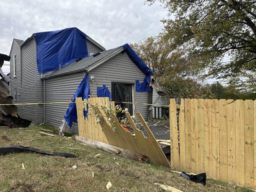 A residential fence near a Louisville, Kentucky, plant that exploded is pictured on Wednesday, Nov. 13, 2024. (AP Photo/Dylan Lovan)