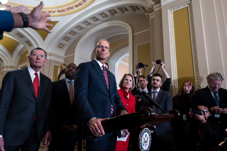 Senate Minority Whip John Thune, R-S.D., joined at left by Sen. John Barrasso, R-Wyo., meets with reporters after he was elected to succeed longtime GOP leader Mitch McConnell of Kentucky, at the Capitol in Washington, Wednesday, Nov. 13, 2024. (AP Photo/J. Scott Applewhite)