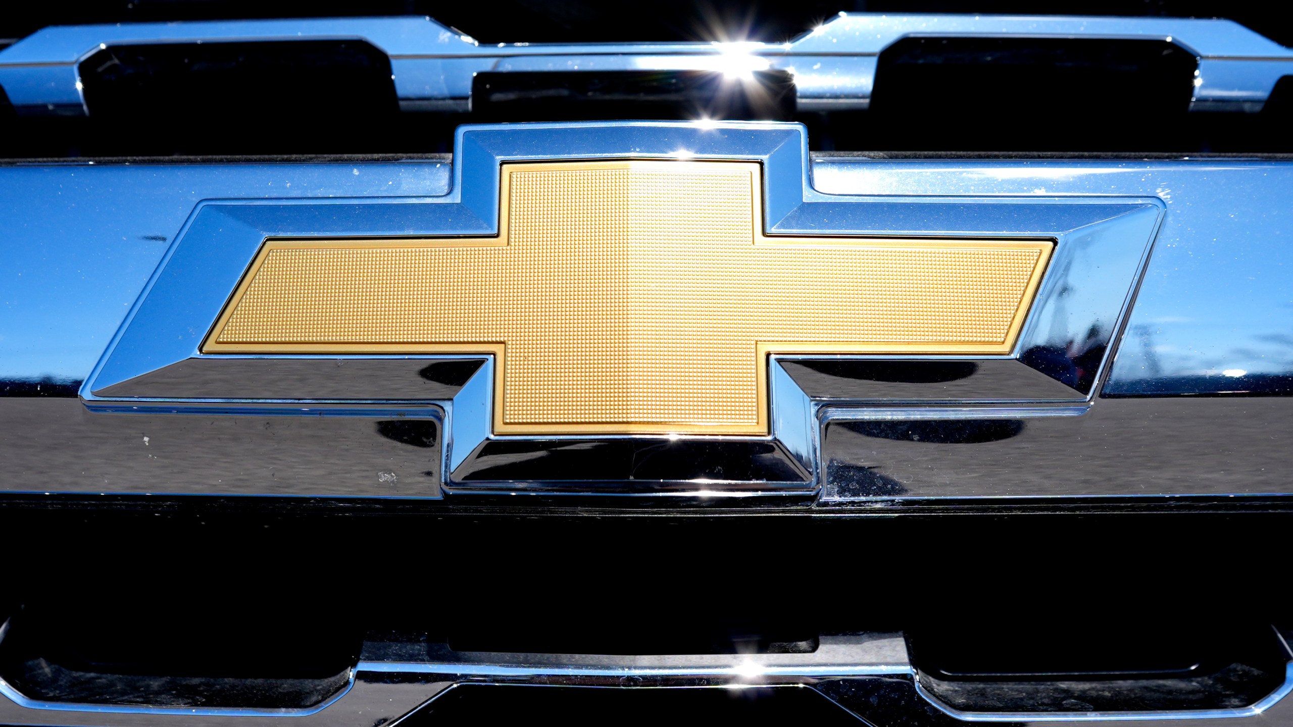 FILE - The Chevrolet logo is seen at a new and used vehicles dealership in Palatine, Ill., on March 20, 2024. (AP Photo/Nam Y. Huh)