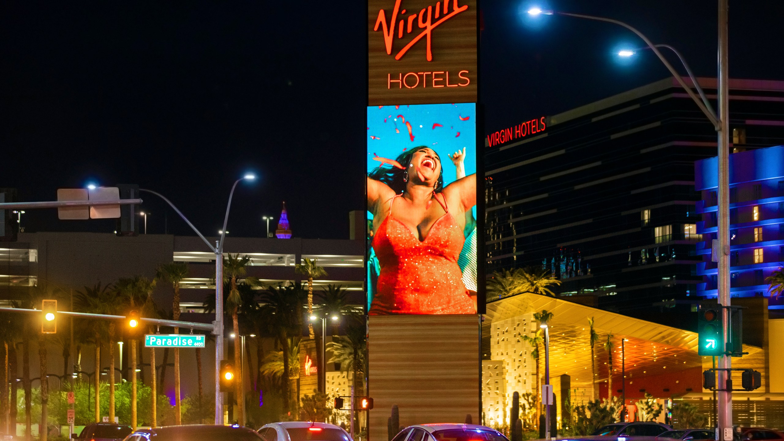 FILE - Virgin Hotels Las Vegas is illuminated on Wednesday, March 24, 2021, in Las Vegas. (Benjamin Hager/Las Vegas Review-Journal via AP, File)