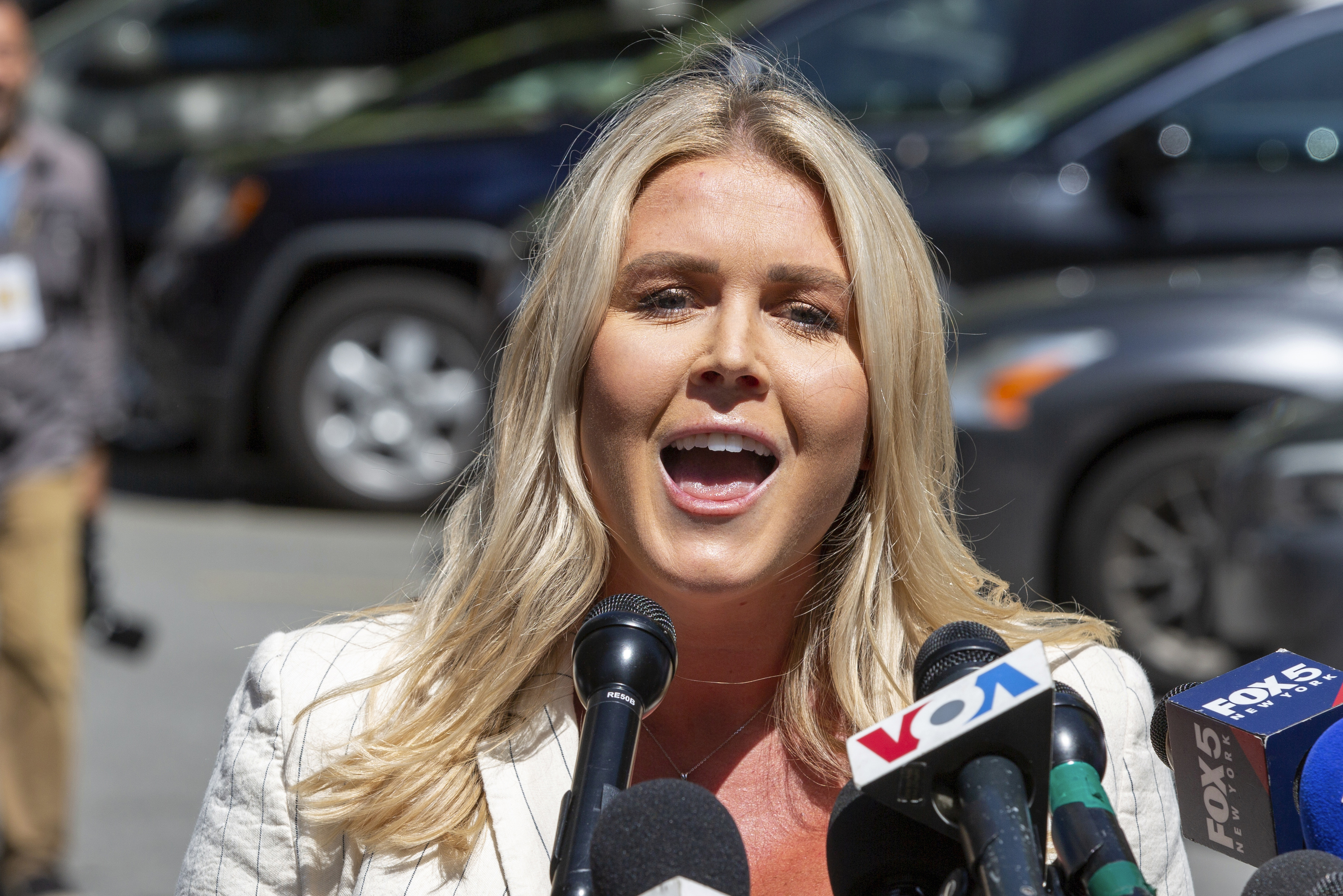 FILE - Karoline Leavitt speaks to the news media across the street from Republican presidential nominee former President Donald Trump's criminal trial in New York, May 28, 2024. (AP Photo/Ted Shaffrey, File)