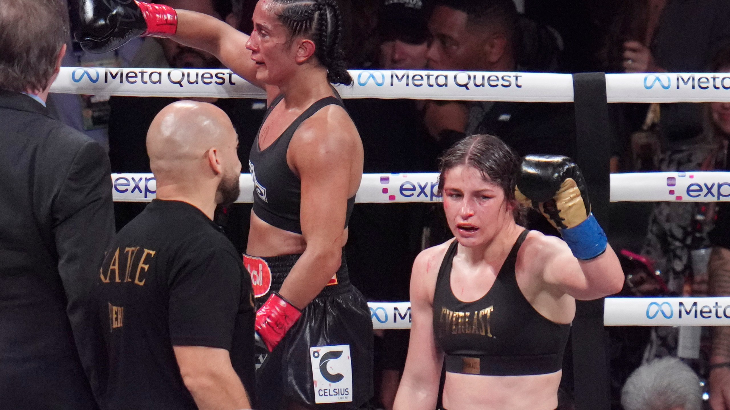 Amanda Serrano, left, and Katie Taylor react after their undisputed super lightweight title bout, Friday, Nov. 15, 2024, in Arlington, Texas. (AP Photo/Julio Cortez)