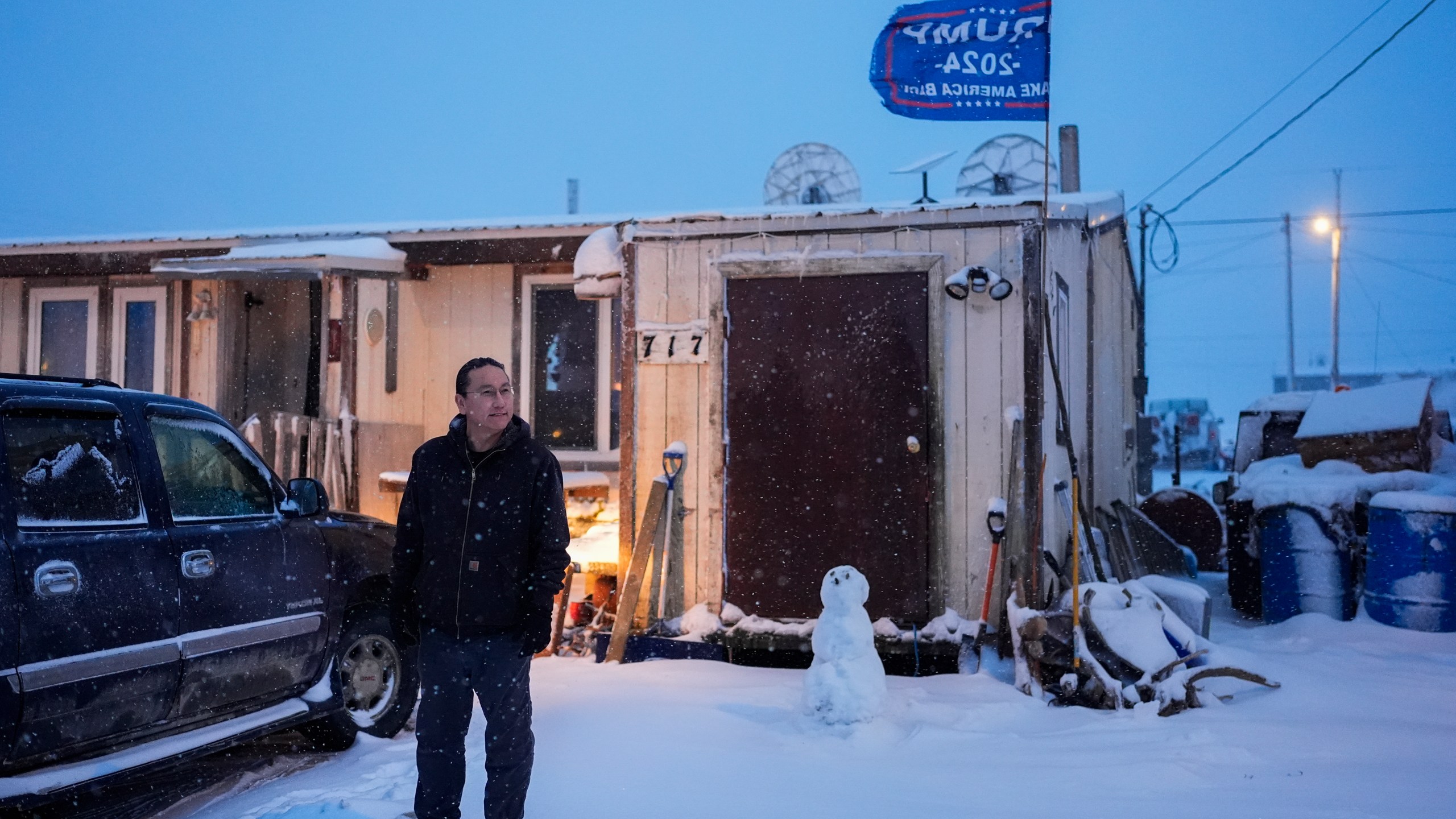 FILE- Charles Lampe, president of the Kaktovik Inupiat Corporation and a city council member, poses for a portrait outside his home, Wednesday, Oct. 16, 2024, in Kaktovik, Alaska. (AP Photo/Lindsey Wasson, File)