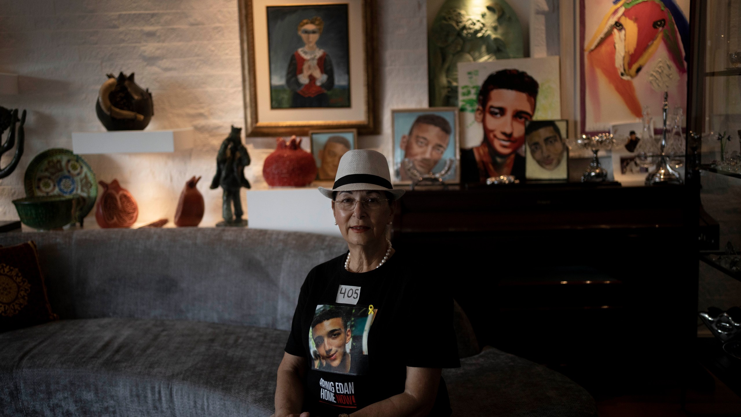 Varda Ben Baruch, whose grandson Edan Alexander is held hostage in the Gaza Strip by Hamas militants, poses for a portrait at home in Tel Aviv, Israel, Thursday, Nov. 14, 2024. (AP Photo/Maya Alleruzzo)