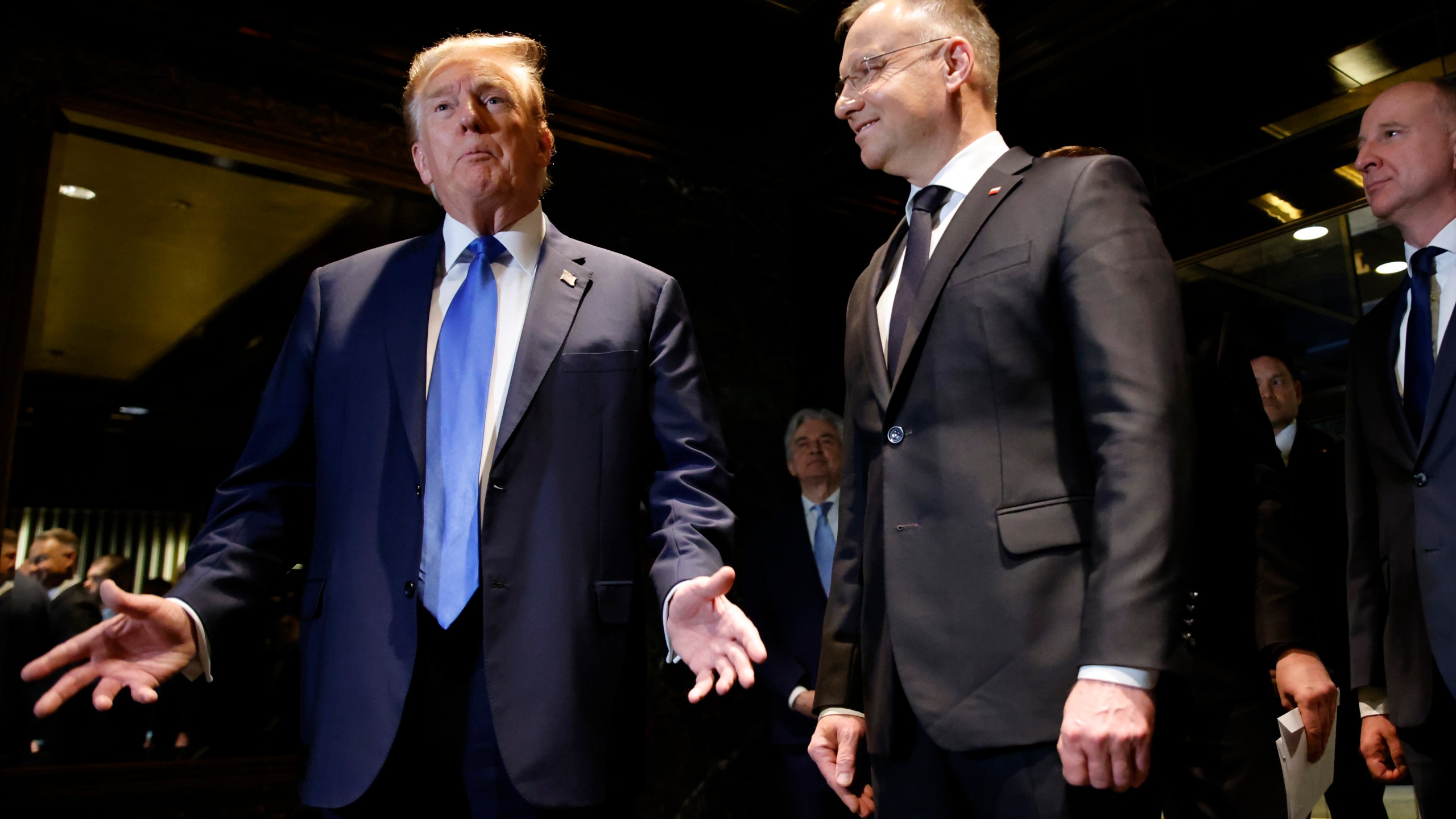 FILE - Republican presidential candidate former US President Donald Trump speaks as he meets with Poland's President Andrzej Duda, right, at Trump Tower in New York, April 17, 2024. (AP Photo/Stefan Jeremiah, File)