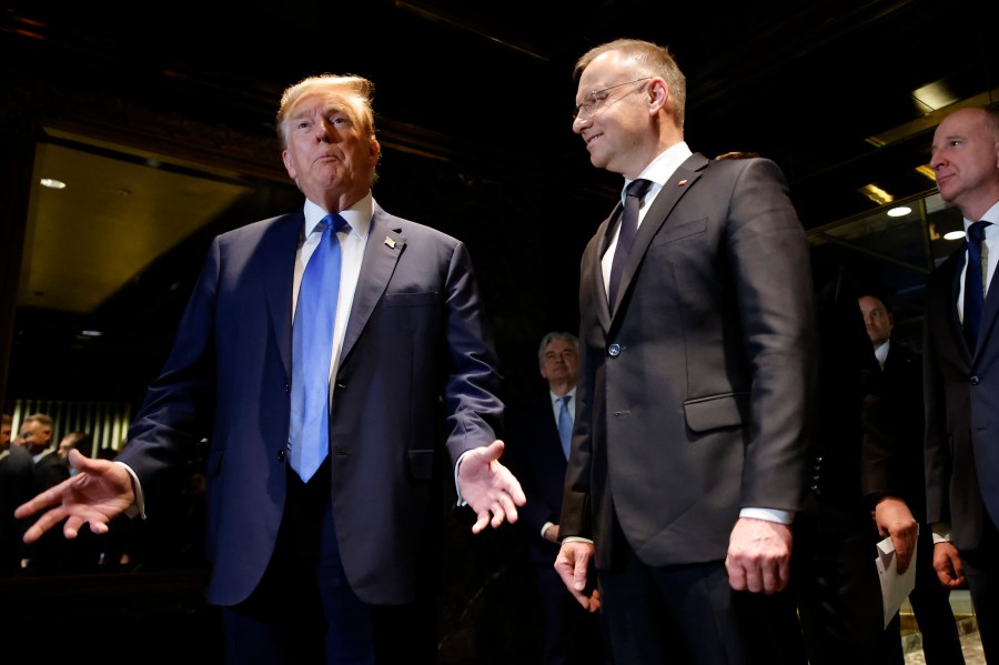 FILE - Republican presidential candidate former US President Donald Trump speaks as he meets with Poland's President Andrzej Duda, right, at Trump Tower in New York, April 17, 2024. (AP Photo/Stefan Jeremiah, File)