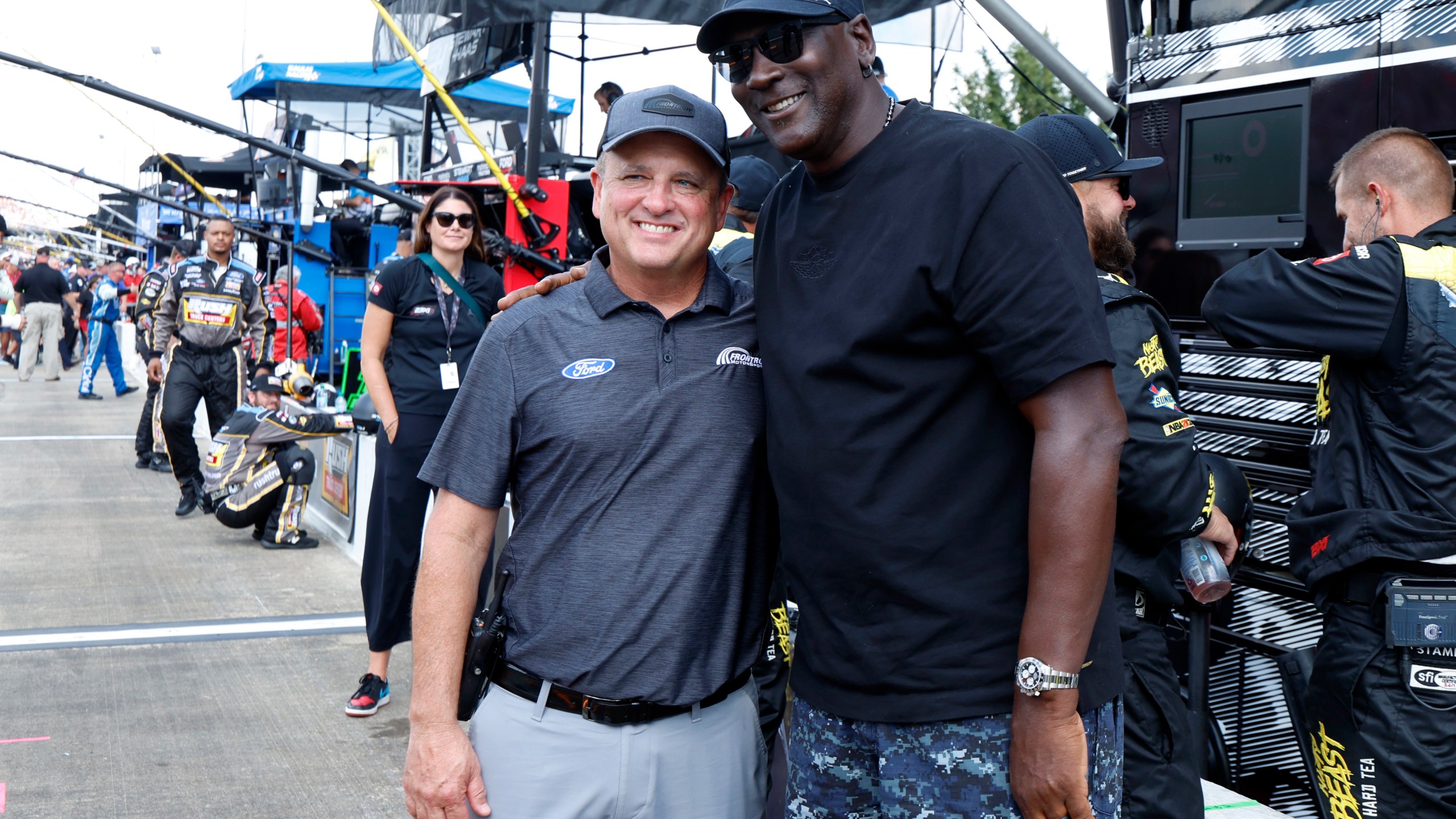 FILE - Bob Jenkins, owner of Front Row Motorsports, and Michael Jordan, co-owner of 23XI Racing, pose before a NASCAR Cup Series auto race at Talladega Superspeedway, Oct. 6, 2024, in Talladega, Ala. (AP Photo/Butch Dill, File)