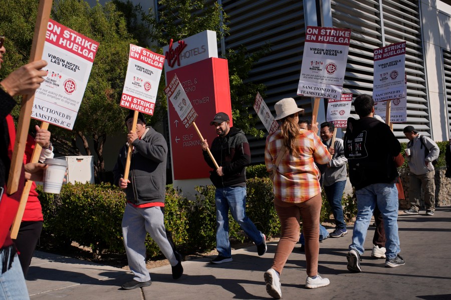 Members of the Culinary Workers Union picket in front of the Virgin Hotels Las Vegas, Friday, Nov. 15, 2024, in Las Vegas. (AP Photo/John Locher)