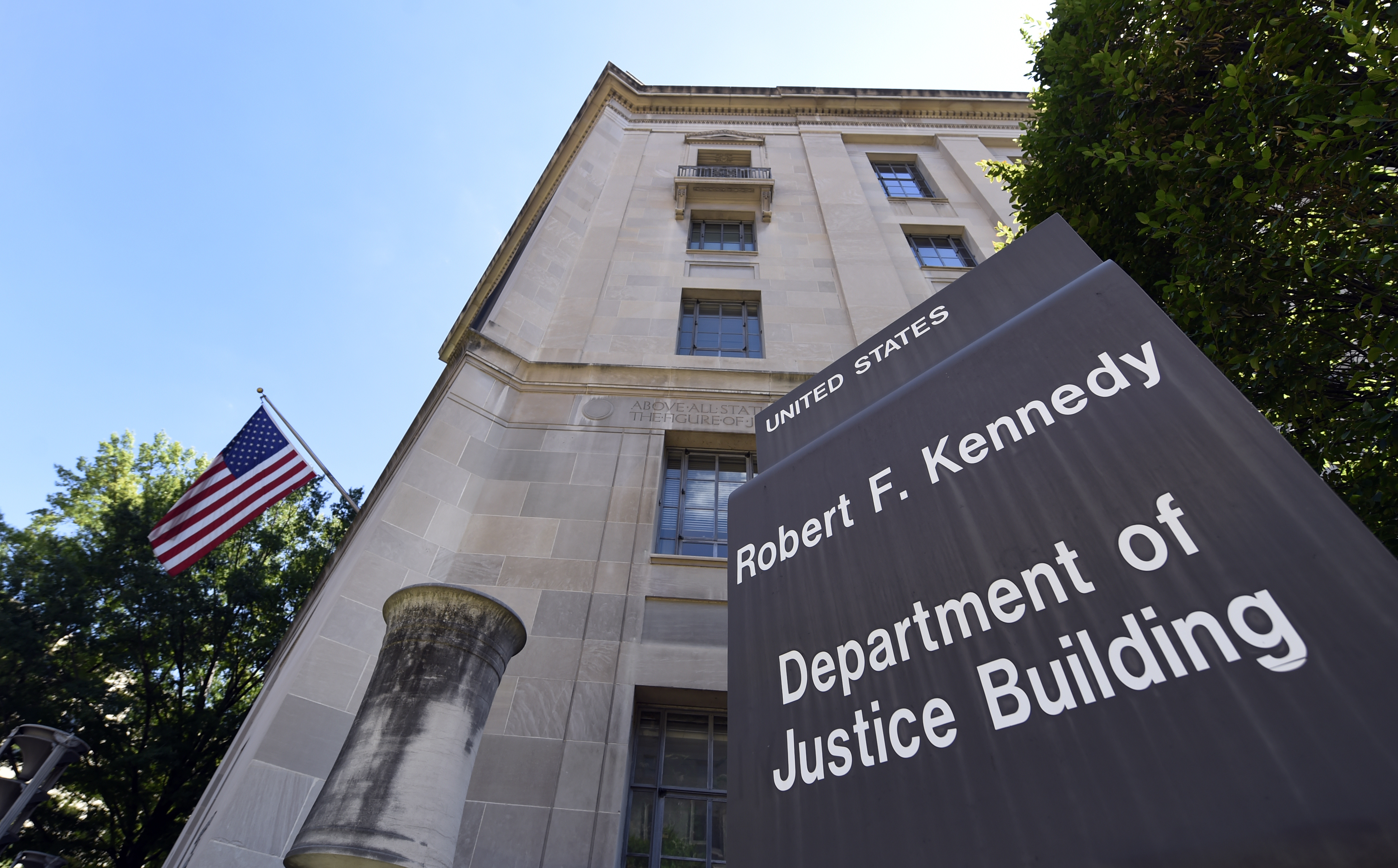 FILE - The view of the Justice Department in Washington, Thursday, Aug. 27, 2015. (AP Photo/Susan Walsh, File)