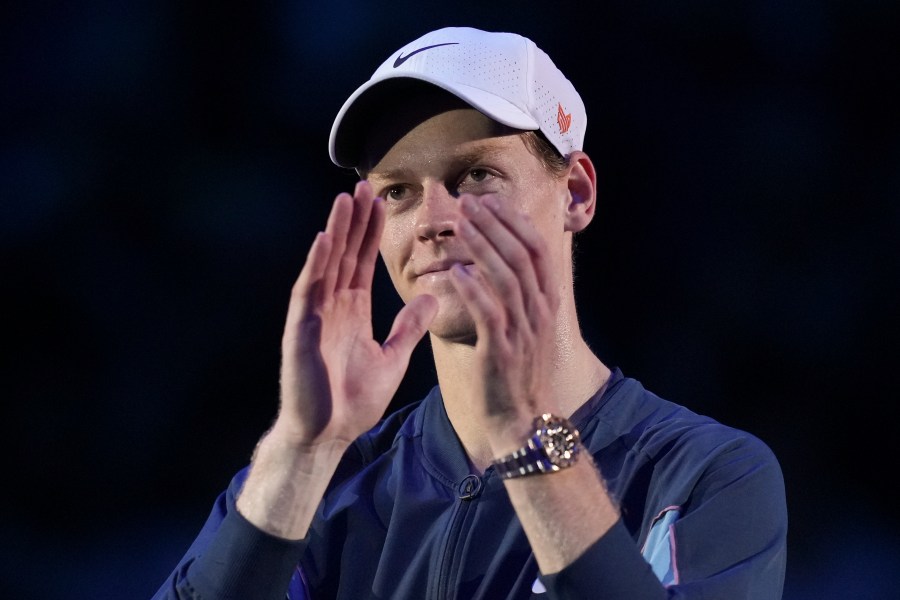 Italy's Jannik Sinner reacts after winning during the semifinal tennis match of the ATP World Tour Finals against Norway's Casper Ruud at the Inalpi Arena in Turin, Italy, Saturday, November 16, 2024. (AP Photo/Antonio Calanni)