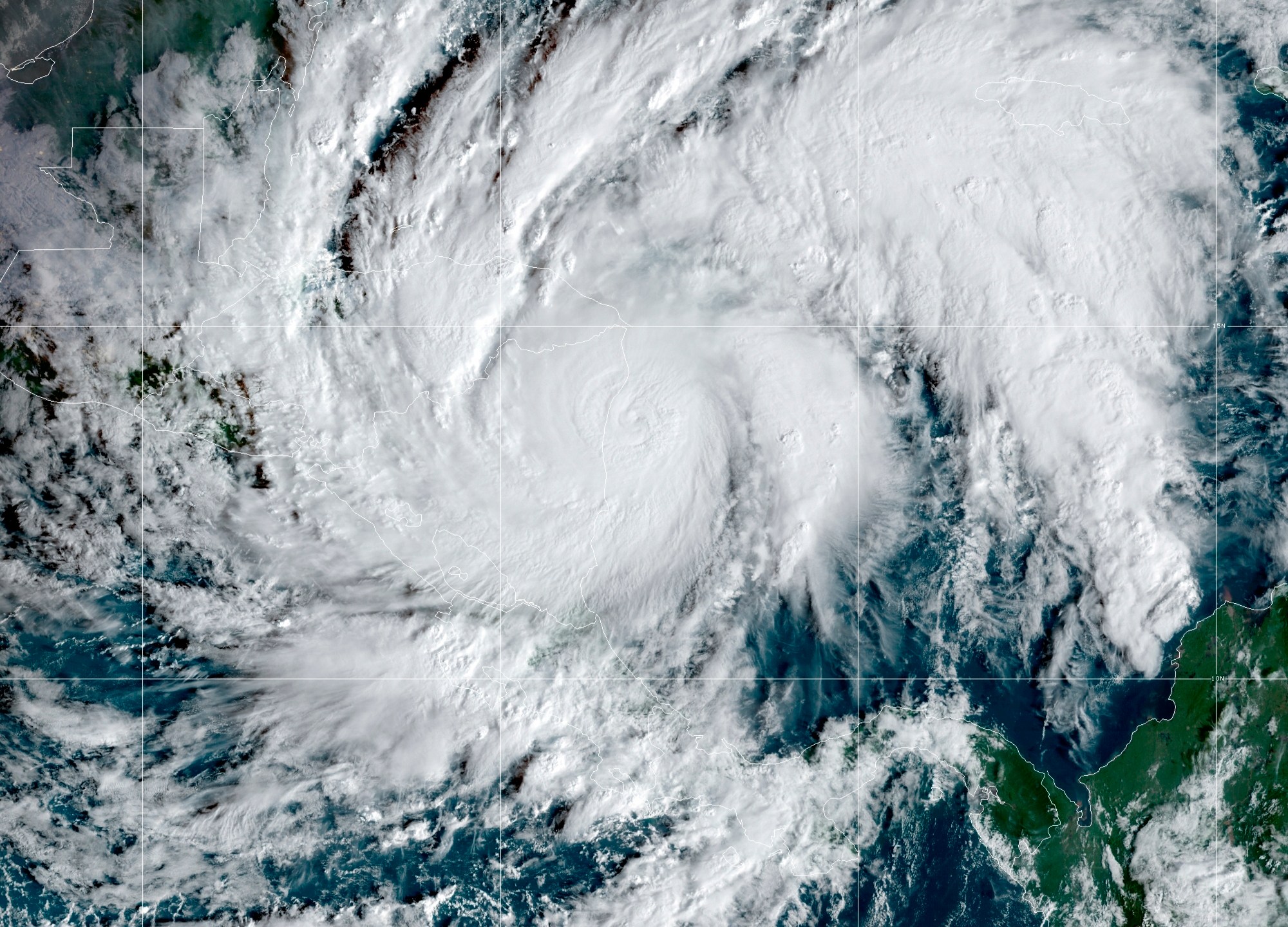 FILE - This GeoColor satellite image taken, Nov. 3, 2020, and provided by NOAA, shows Hurricane Eta in the Caribbean Sea, arriving at Nicaragua's northern shore. (NOAA via AP, File)