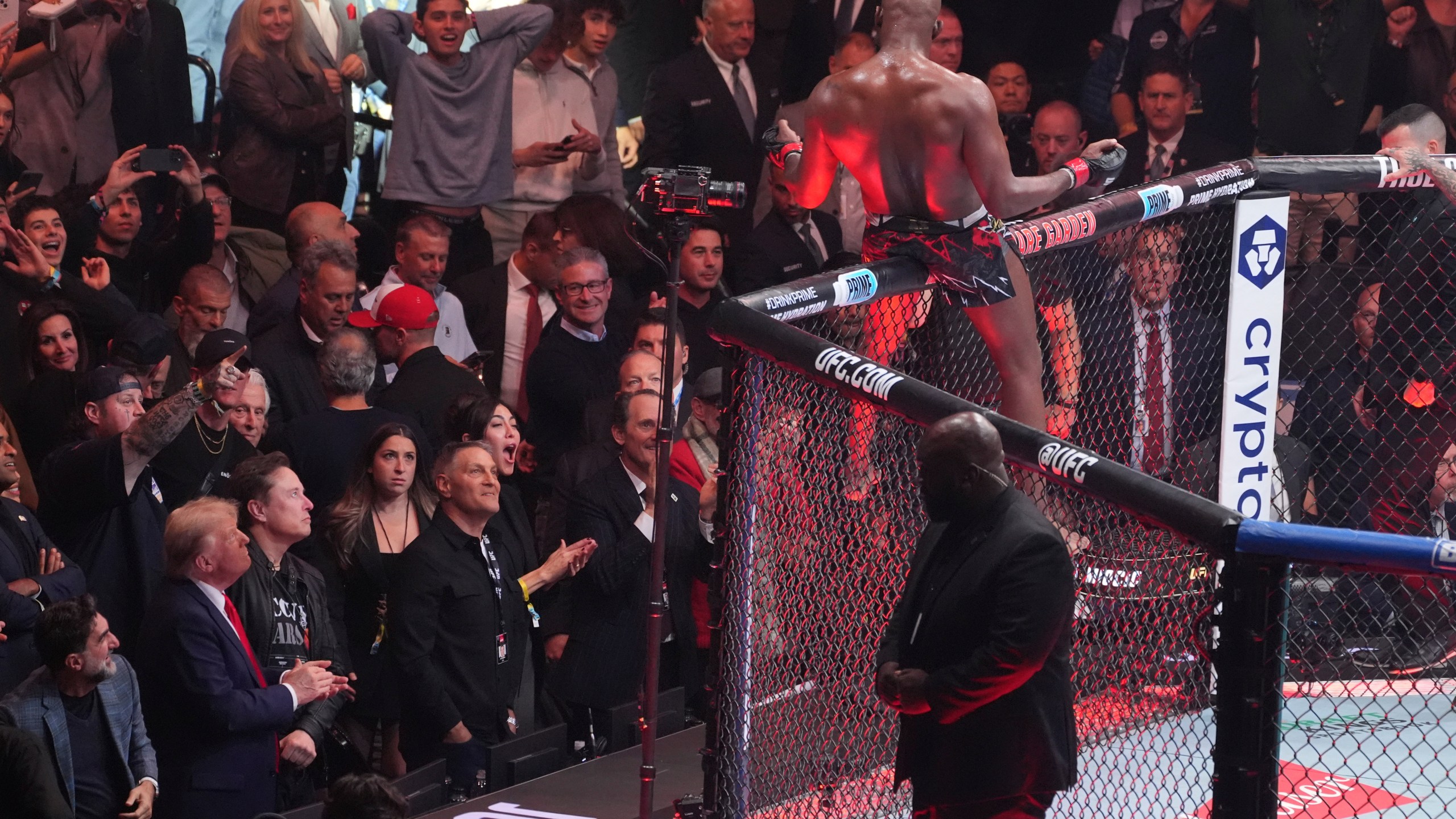 President-elect Donald Trump watches as Jon Jones reacts after defeating Stipe Miocic at UFC 309 at Madison Square Garden, early Sunday, Nov. 17, 2024, in New York. (AP Photo/Evan Vucci)