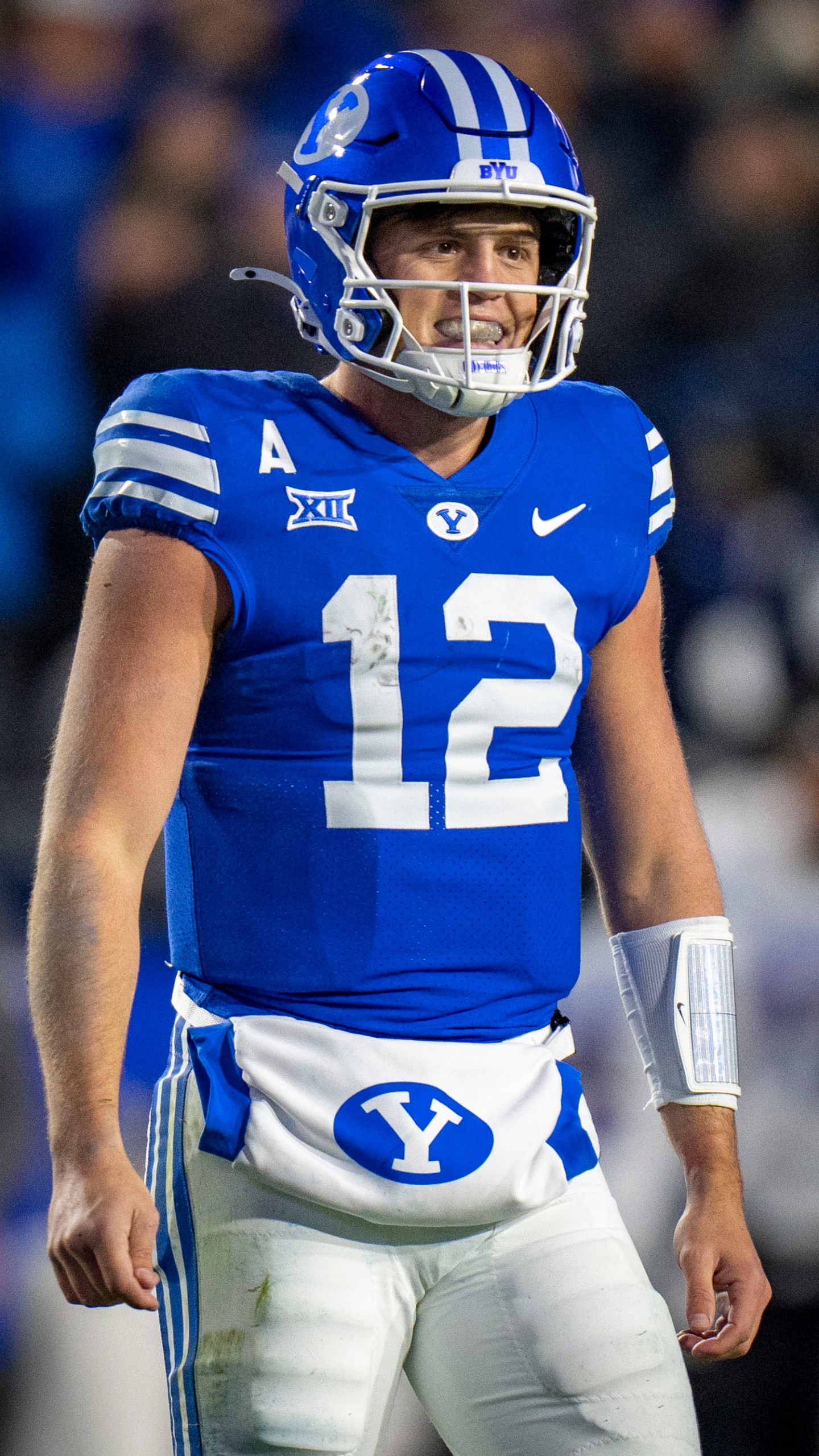 BYU quarterback Jake Retzlaff (12) leaves the field after BYU failed to score in the final minutes of the gam, during the second half in an NCAA college football game Saturday, Nov. 16, 2024, in Provo. (AP Photo/Rick Egan)