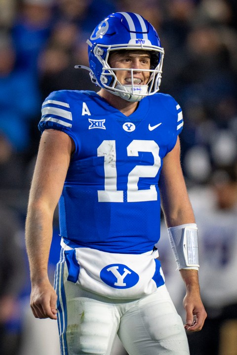 BYU quarterback Jake Retzlaff (12) leaves the field after BYU failed to score in the final minutes of the gam, during the second half in an NCAA college football game Saturday, Nov. 16, 2024, in Provo. (AP Photo/Rick Egan)