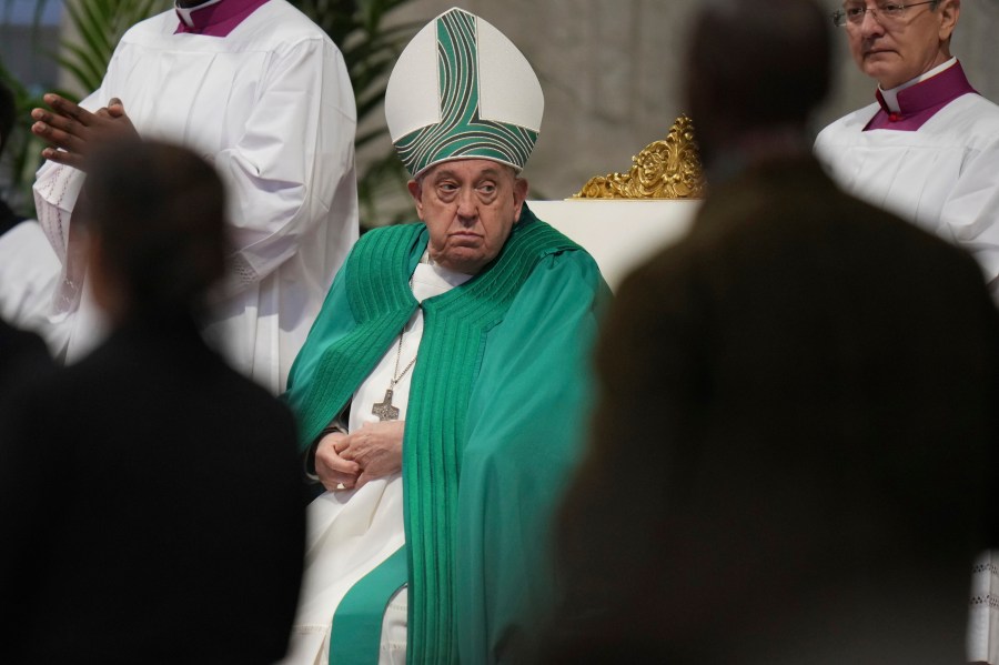 Pope Francis presides over a mass on the occasion of the World Day of the Poor in St. Peter's Basilica, at the Vatican, Sunday, Nov. 17, 2024. (AP Photo/Alessandra Tarantino)