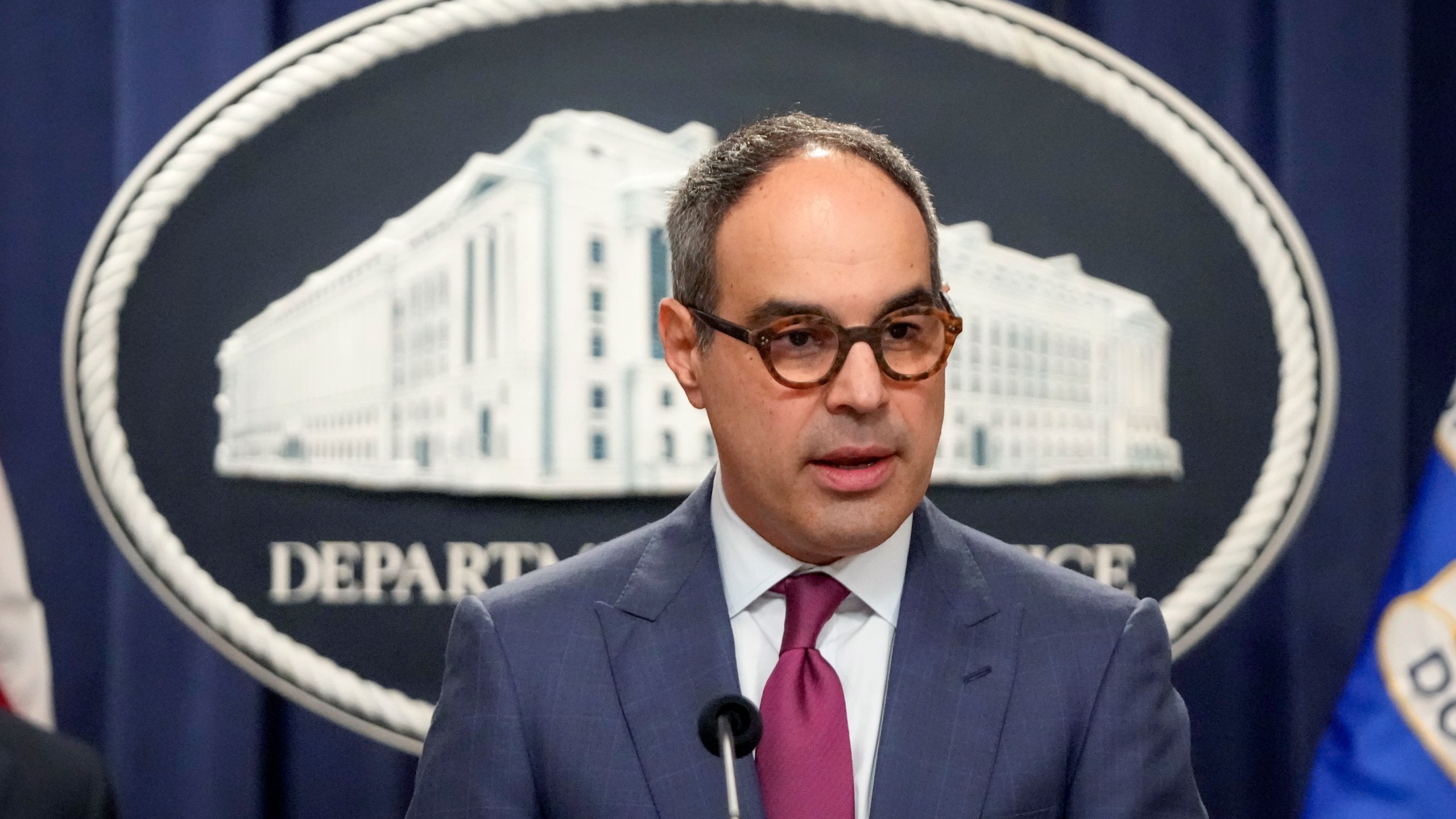 FILE - Assistant Attorney General Jonathan Kanter of the Justice Department's Antitrust Division speaks with reporters during a news conference at the Department of Justice, Aug. 23, 2024, in Washington. (AP Photo/Mark Schiefelbein, File)